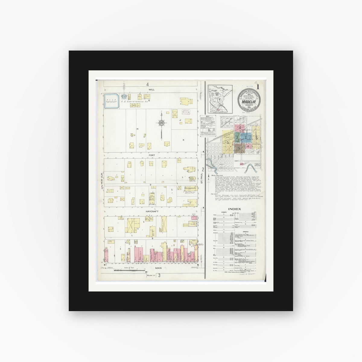 Old map wall art mockup — black gallery frame with white mat — Sanborn Fire Insurance Map from Madelia, Watonwan County, Minnesota (1914) - Complete Map Set