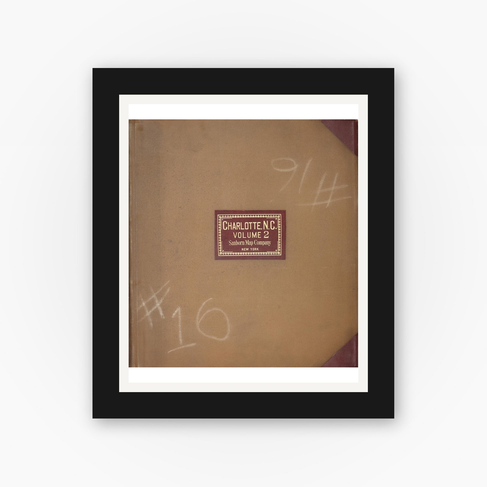 Old map wall art mockup — black gallery frame with white mat — Sanborn Fire Insurance Map from Charlotte, Mecklenburg County, North Carolina (1950) - Complete Map Set