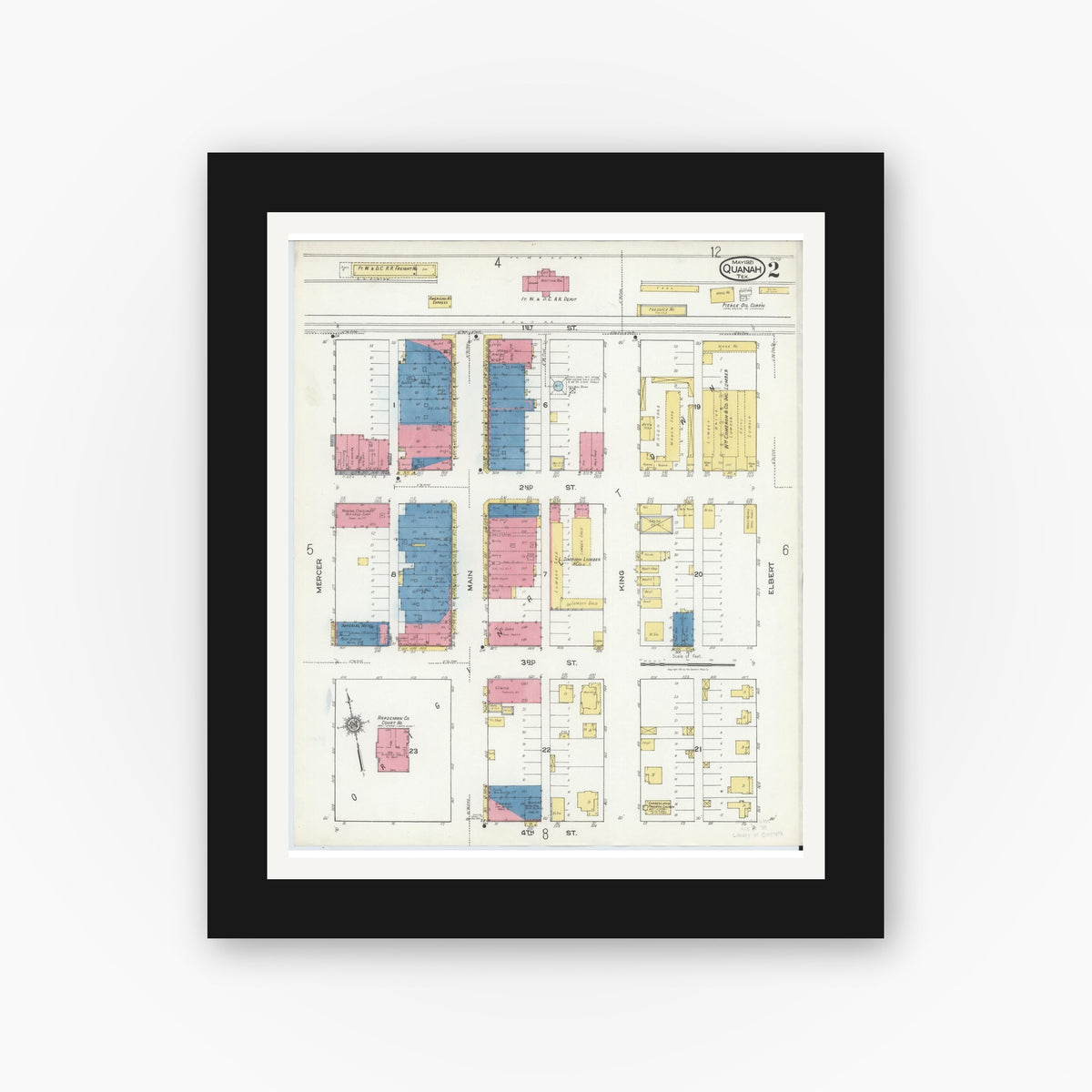Old map wall art mockup — black gallery frame with white mat — Sanborn Fire Insurance Map from Quanah, Hardeman County, Texas (1921), Sheet #0002