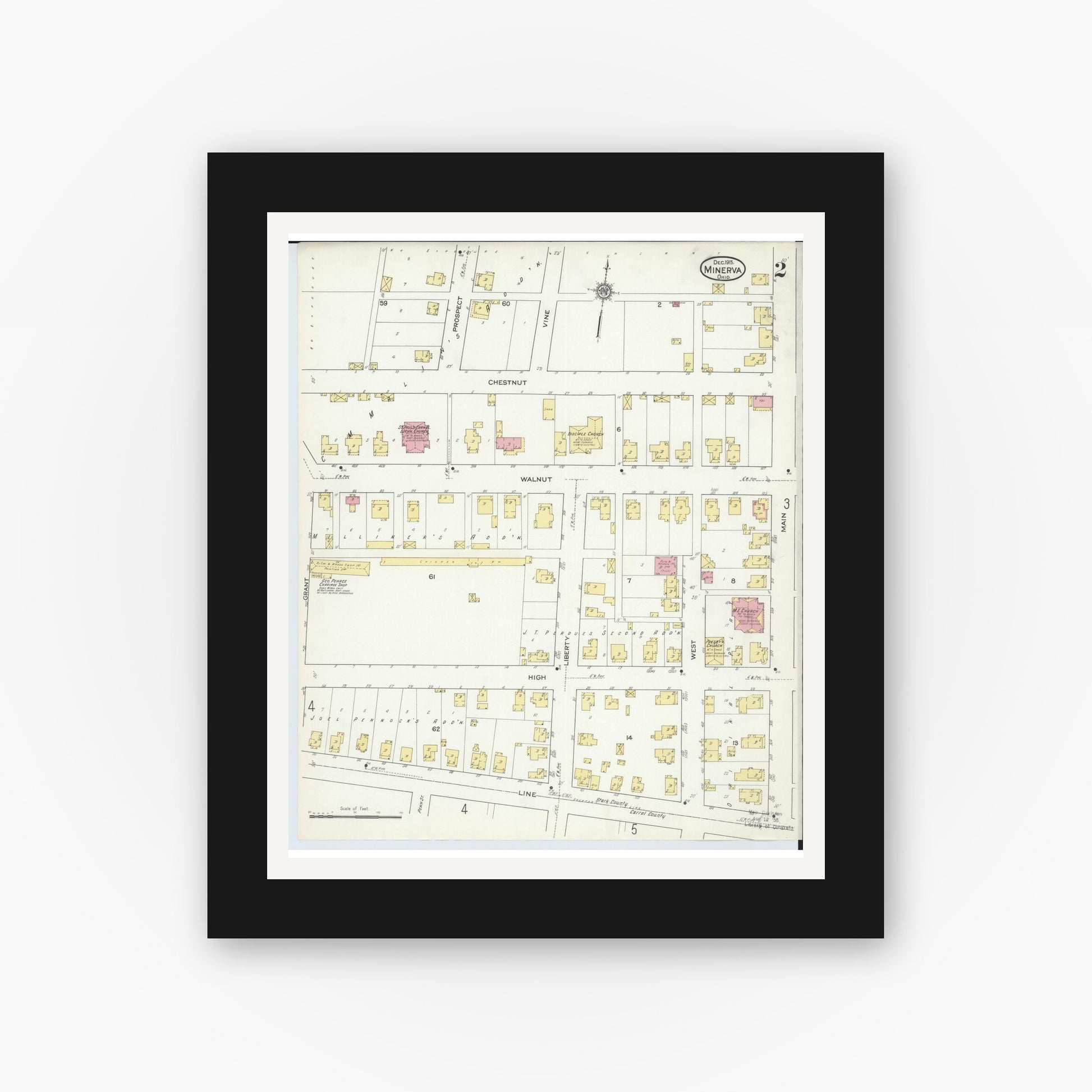 Old map wall art mockup — black gallery frame with white mat — Sanborn Fire Insurance Map from Minerva, Stark And Carroll Counties, Ohio (1915), Sheet #0002