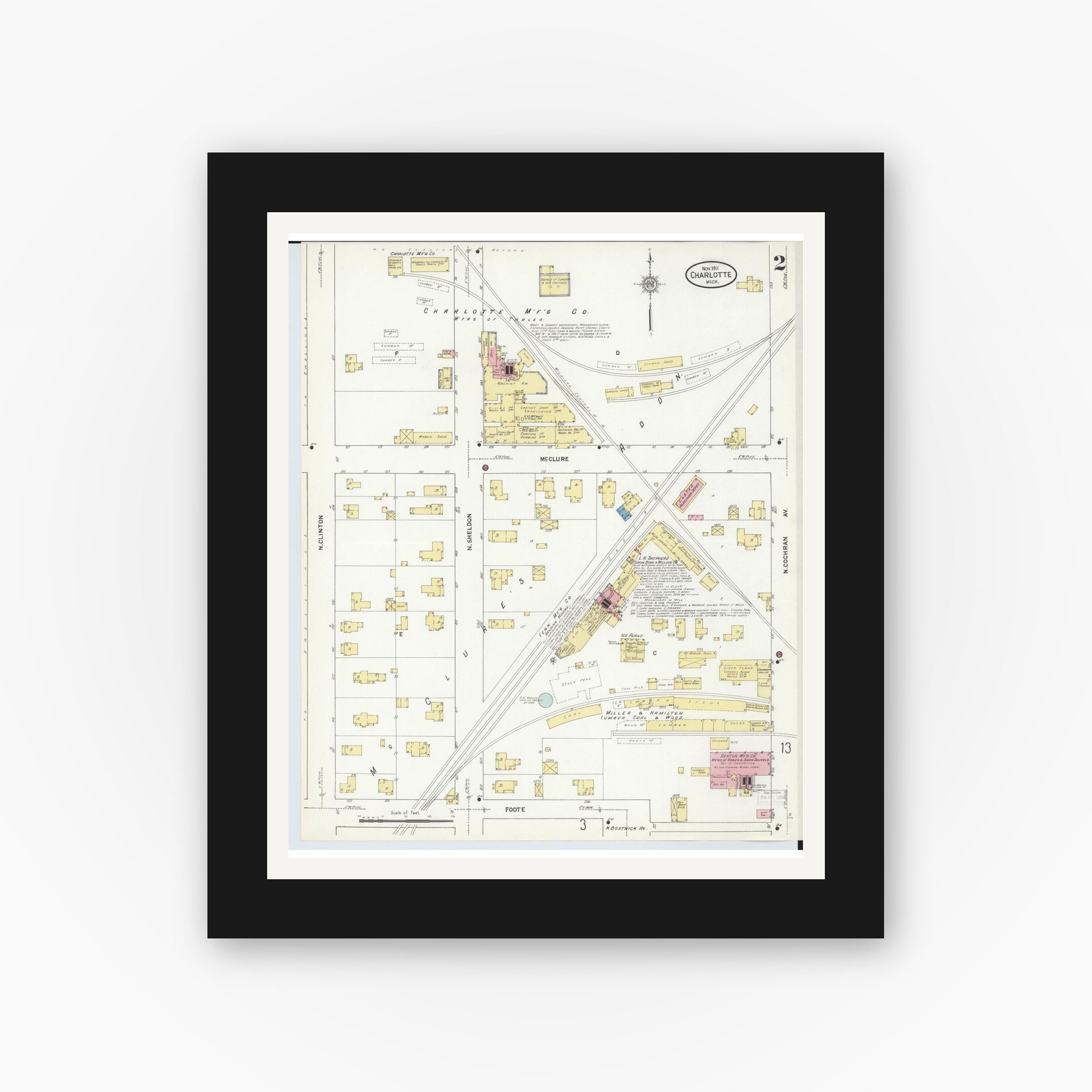 Old map wall art mockup — black gallery frame with white mat — Sanborn Fire Insurance Map from Charlotte, Eaton County, Michigan (1911), Sheet #0002