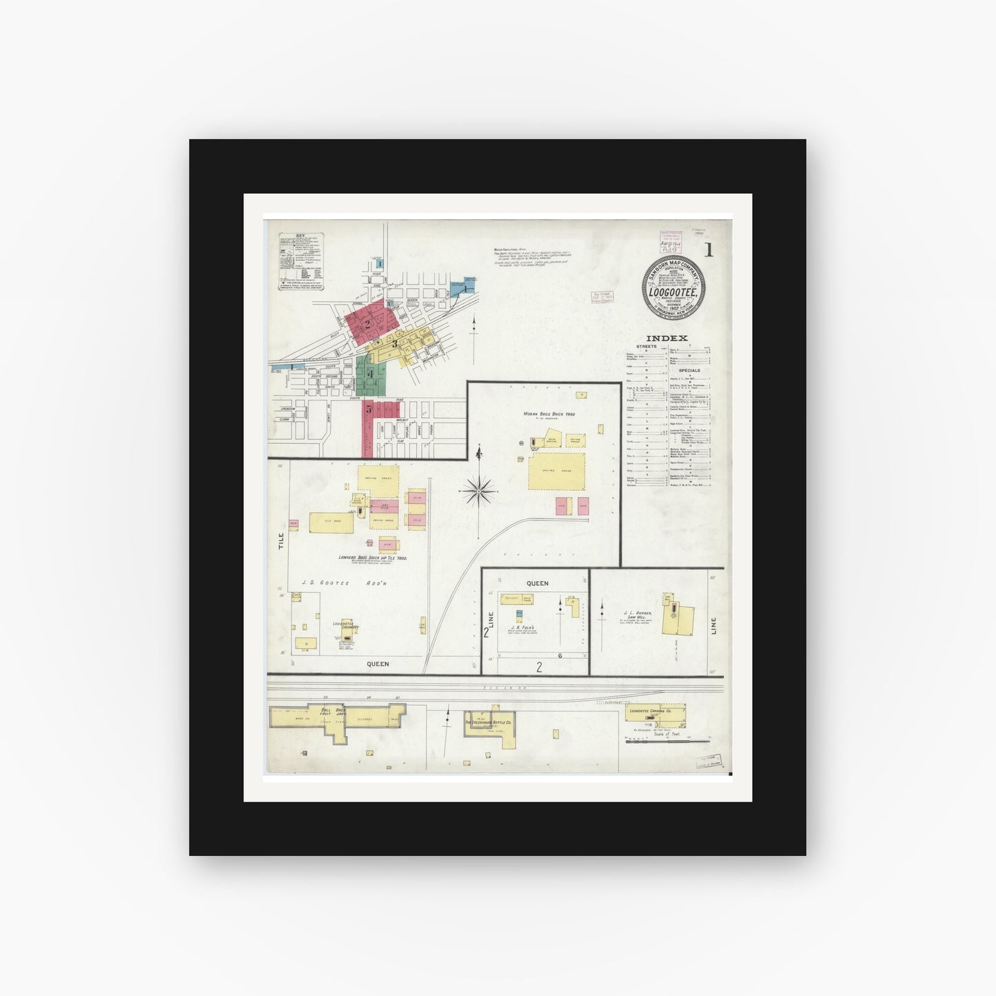 Old map wall art mockup — black gallery frame with white mat — Sanborn Fire Insurance Map from Loogootee, Martin County, Indiana (1907), Sheet #0001