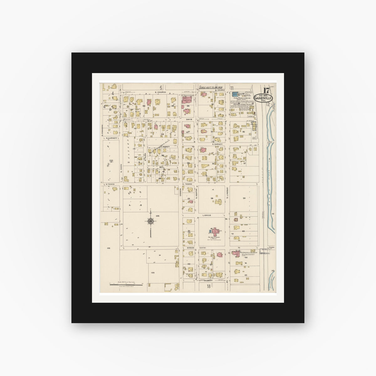 Old map wall art mockup — black gallery frame with white mat — Sanborn Fire Insurance Map from Gainesville, Cooke County, Texas (1922), Sheet #0017