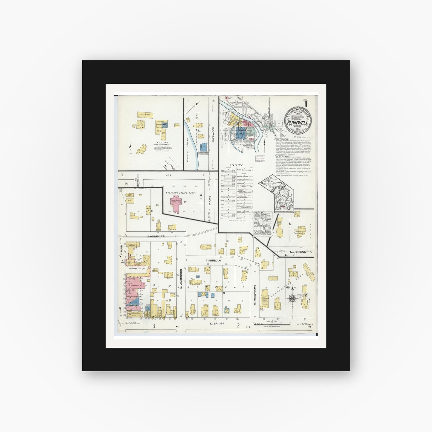 Old map wall art mockup — black gallery frame with white mat — Sanborn Fire Insurance Map from Plainwell, Allegan County, Michigan (1918), Sheet #0001