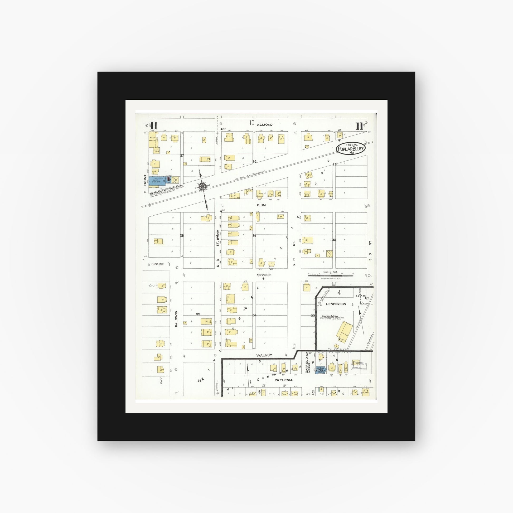 Old map wall art mockup — black gallery frame with white mat — Sanborn Fire Insurance Map from Poplar Bluff, Butler County, Missouri (1924), Sheet #0011