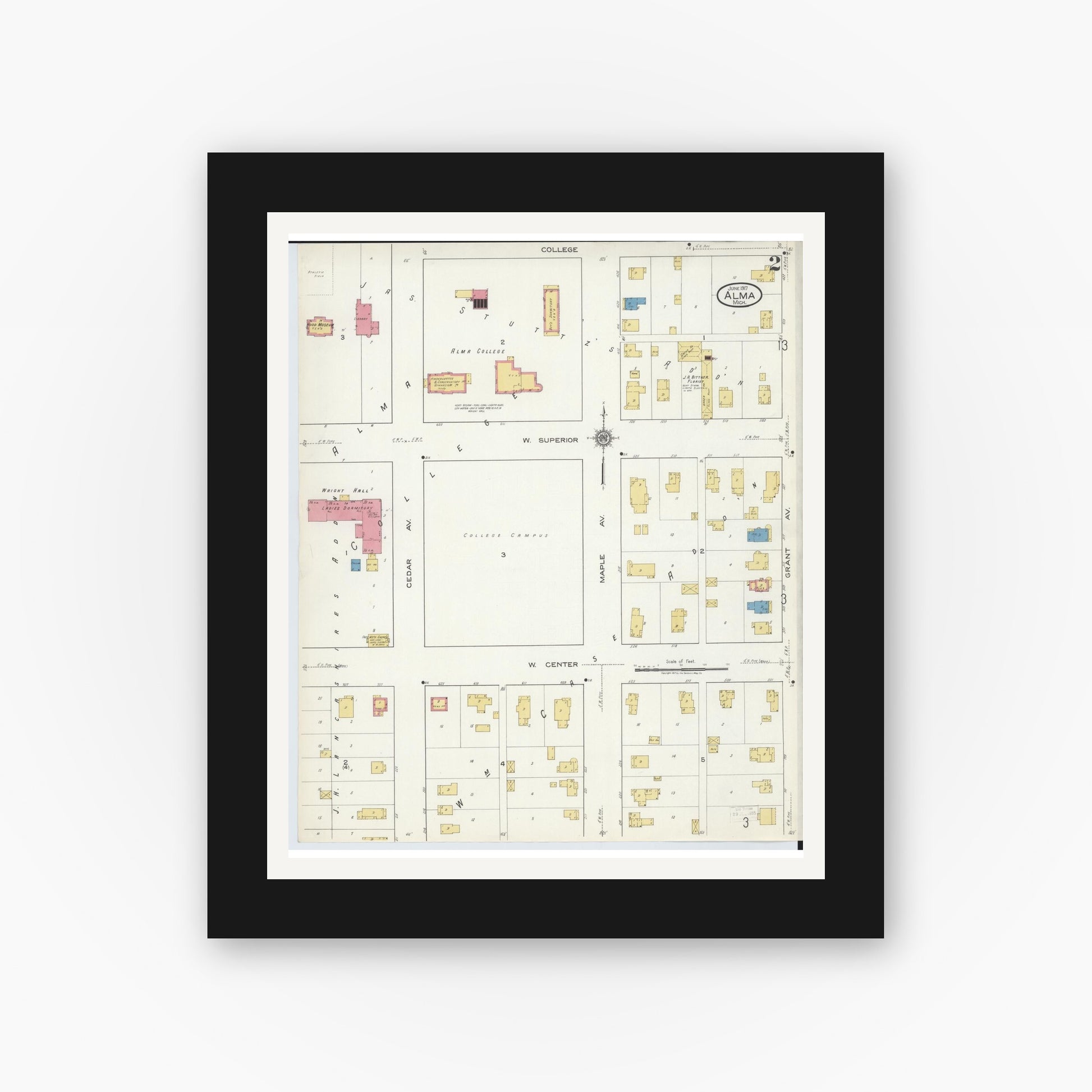Old map wall art mockup — black gallery frame with white mat — Sanborn Fire Insurance Map from Alma, Gratiot County, Michigan (1917), Sheet #0002