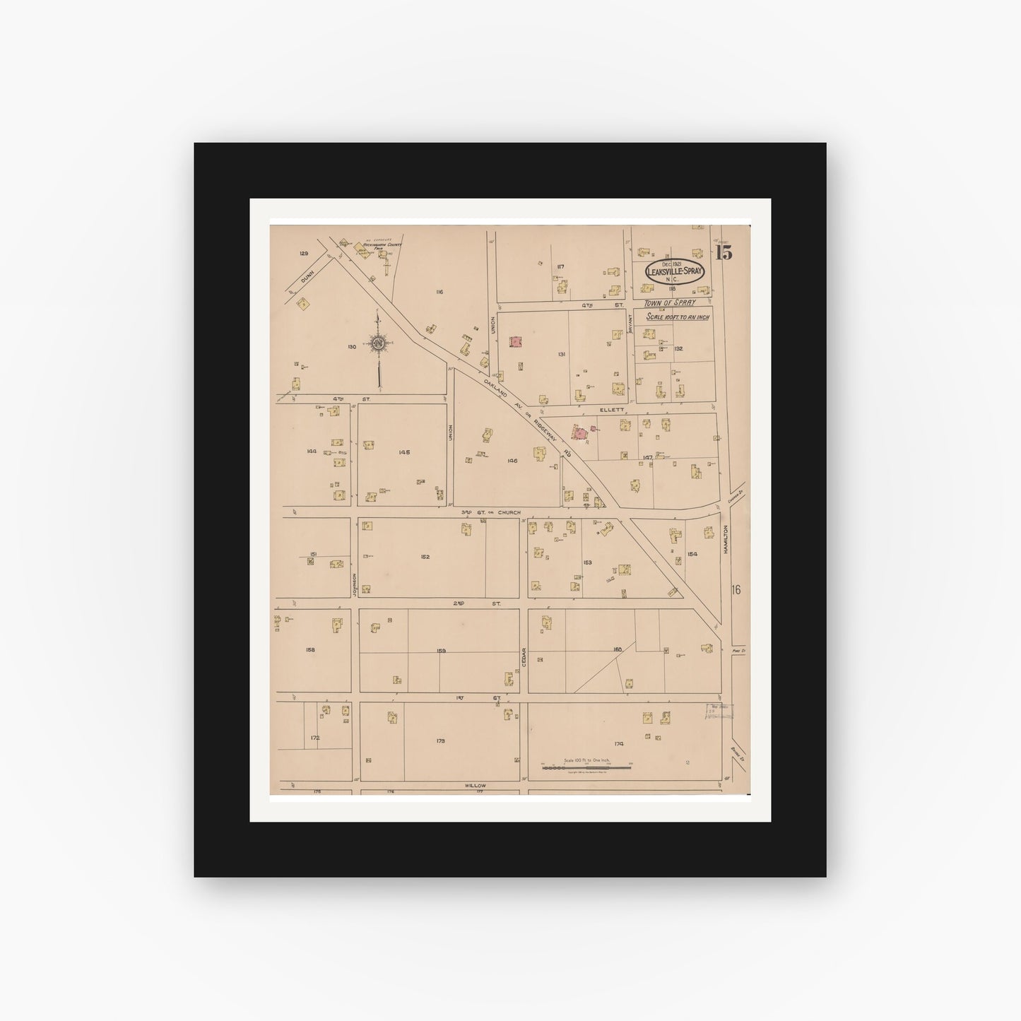 Old map wall art mockup — black gallery frame with white mat — Sanborn Fire Insurance Map from Leaksville-spray, Rockingham County, North Carolina (1921), Sheet #0015