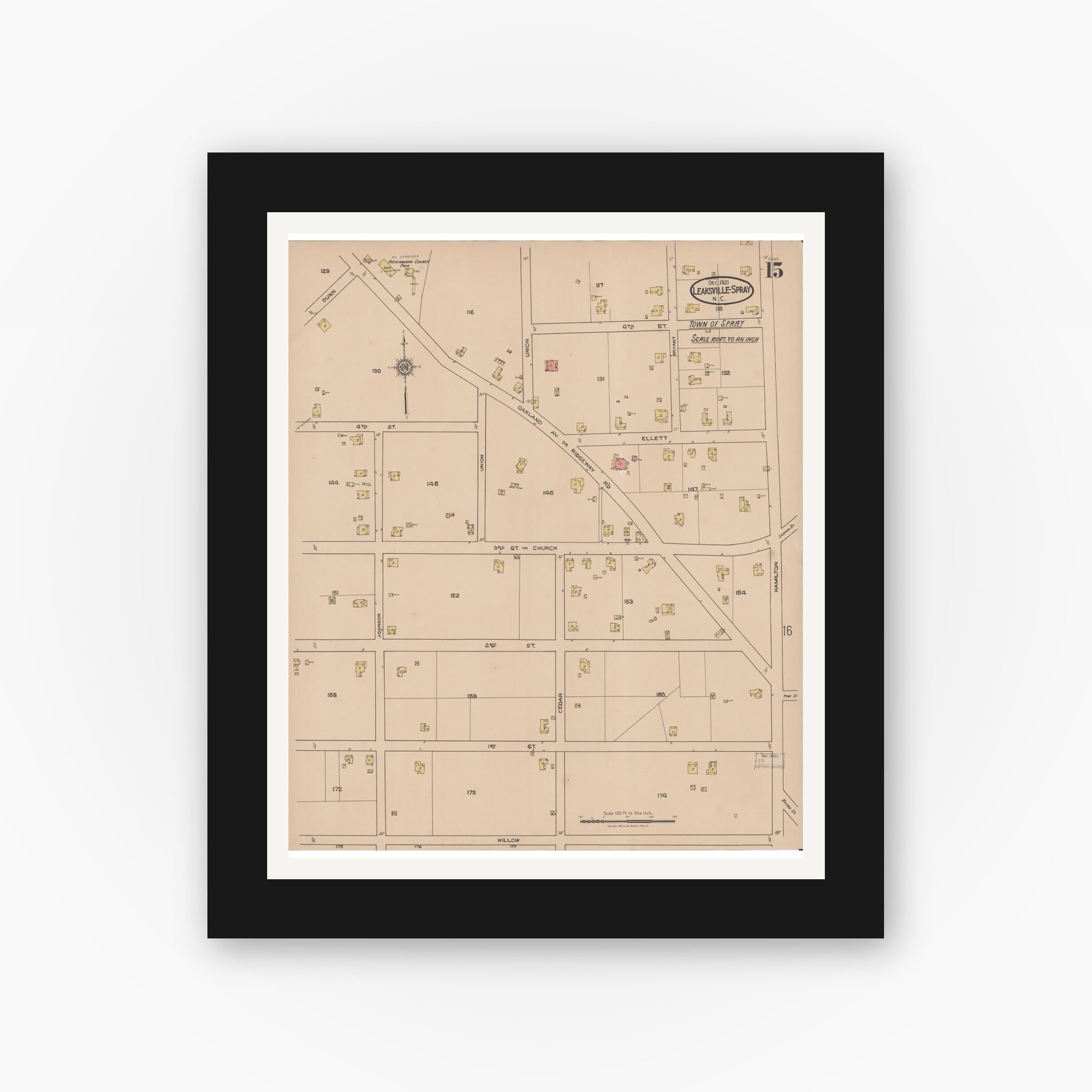 Old map wall art mockup — black gallery frame with white mat — Sanborn Fire Insurance Map from Leaksville-spray, Rockingham County, North Carolina (1921), Sheet #0015