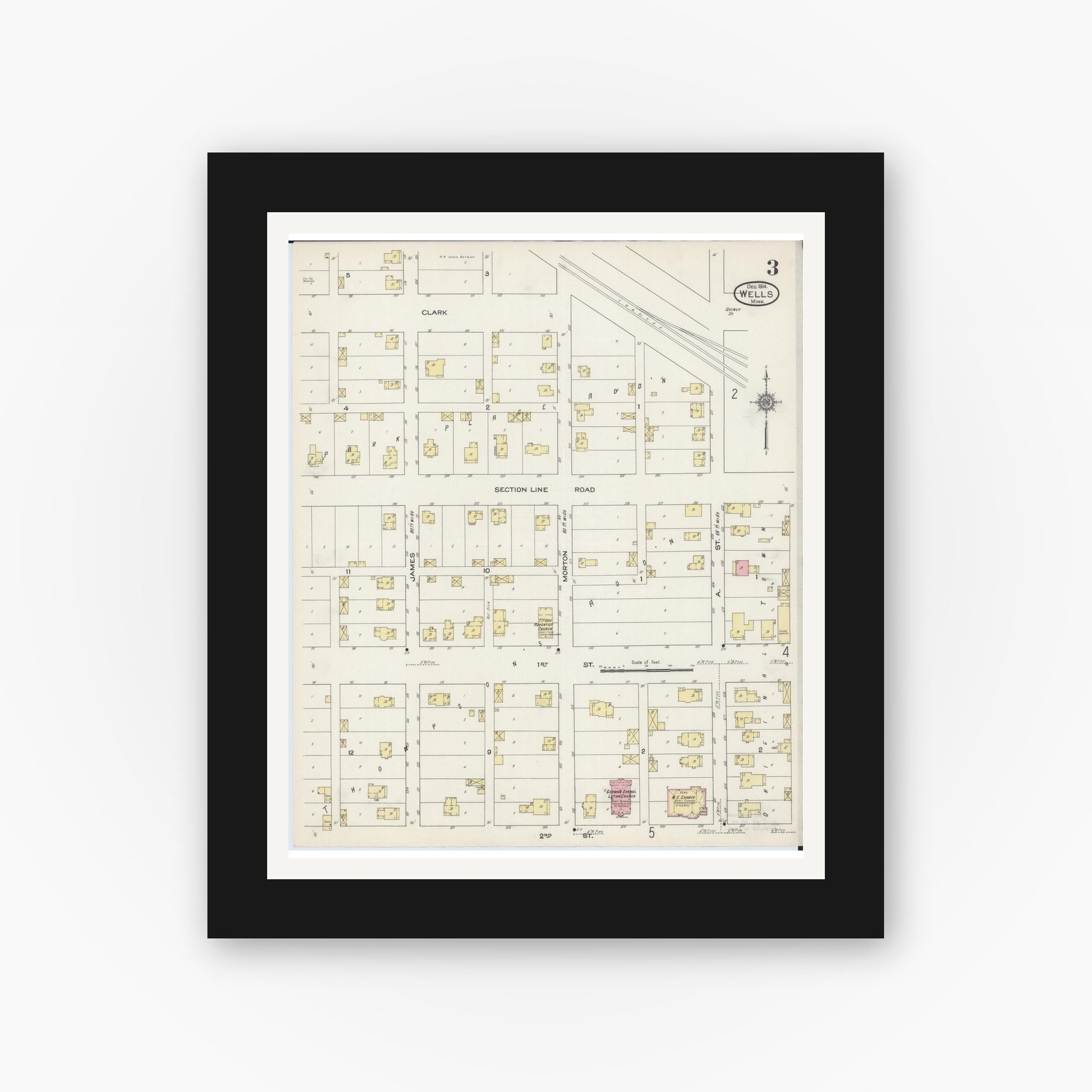 Old map wall art mockup — black gallery frame with white mat — Sanborn Fire Insurance Map from Wells, Faribault County, Minnesota (1914), Sheet #0003
