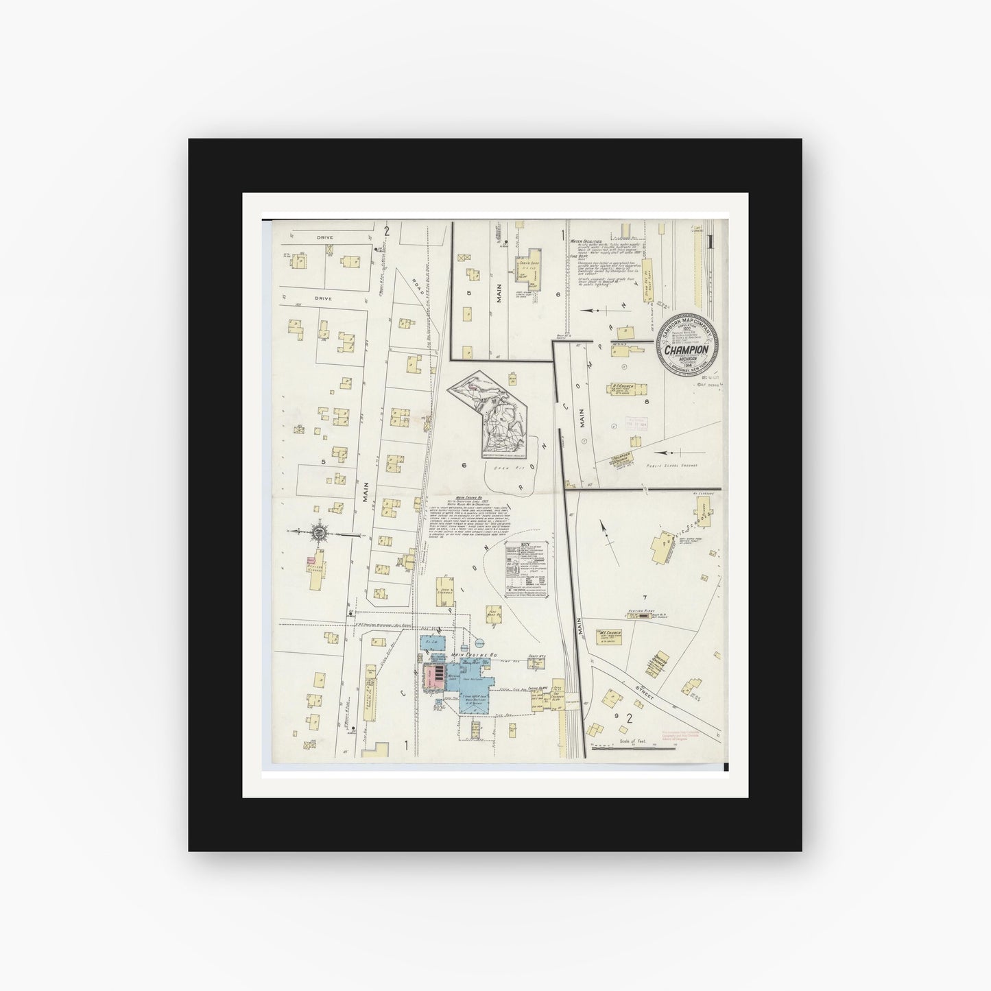 Old map wall art mockup — black gallery frame with white mat — Sanborn Fire Insurance Map from Champion, Marquette County, Michigan (1914), Sheet #0001