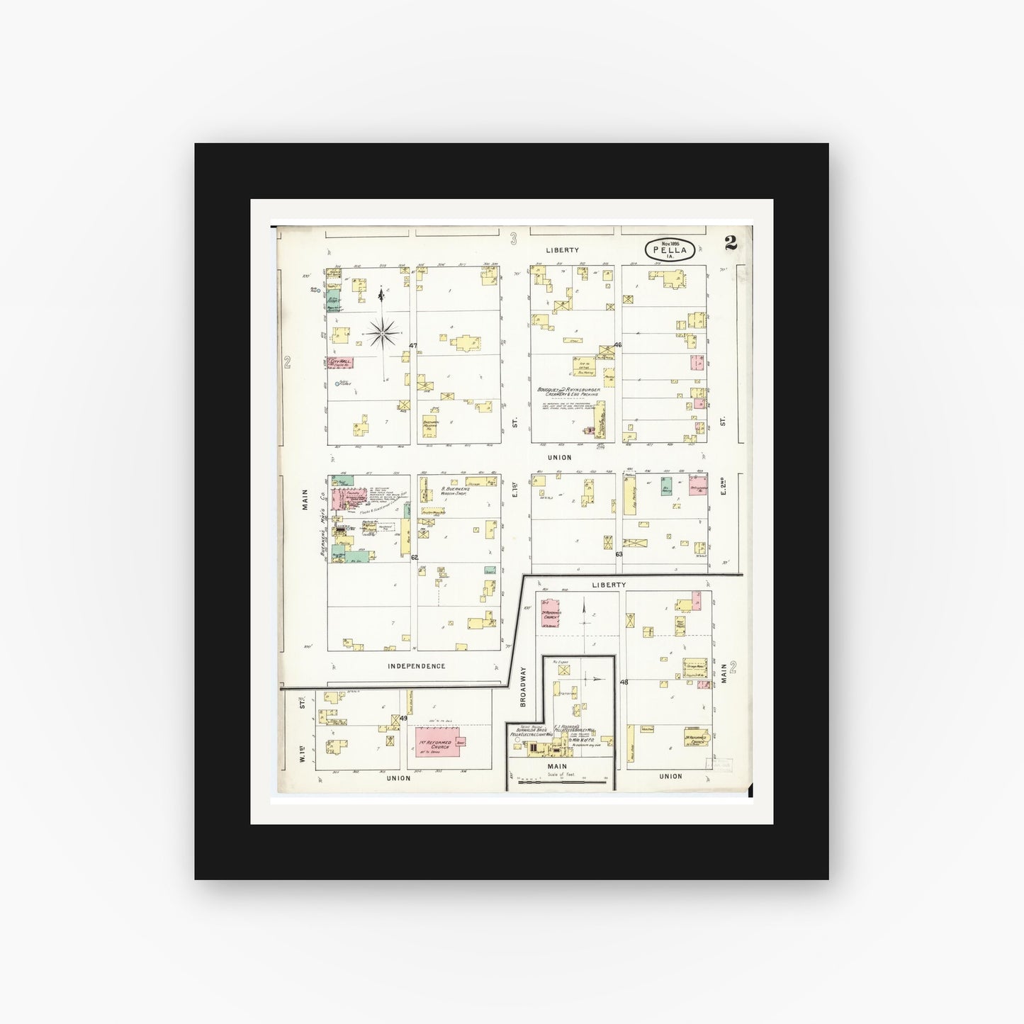 Old map wall art mockup — black gallery frame with white mat — Sanborn Fire Insurance Map from Pella, Marion County, Iowa (1895), Sheet #0002