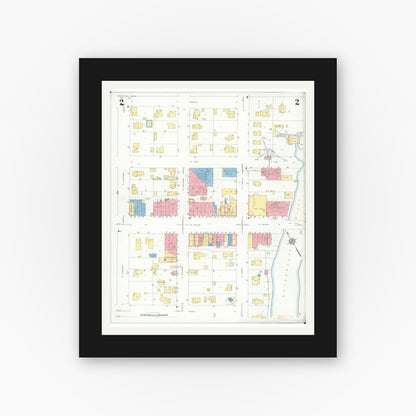 Old map wall art mockup — black gallery frame with white mat — Sanborn Fire Insurance Map from Chesaning, Saginaw County, Michigan (1935), Sheet #0002