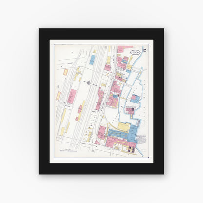 Old map wall art mockup — black gallery frame with white mat — Sanborn Fire Insurance Map from Sterling, Whiteside County, Illinois (1916), Sheet #0012