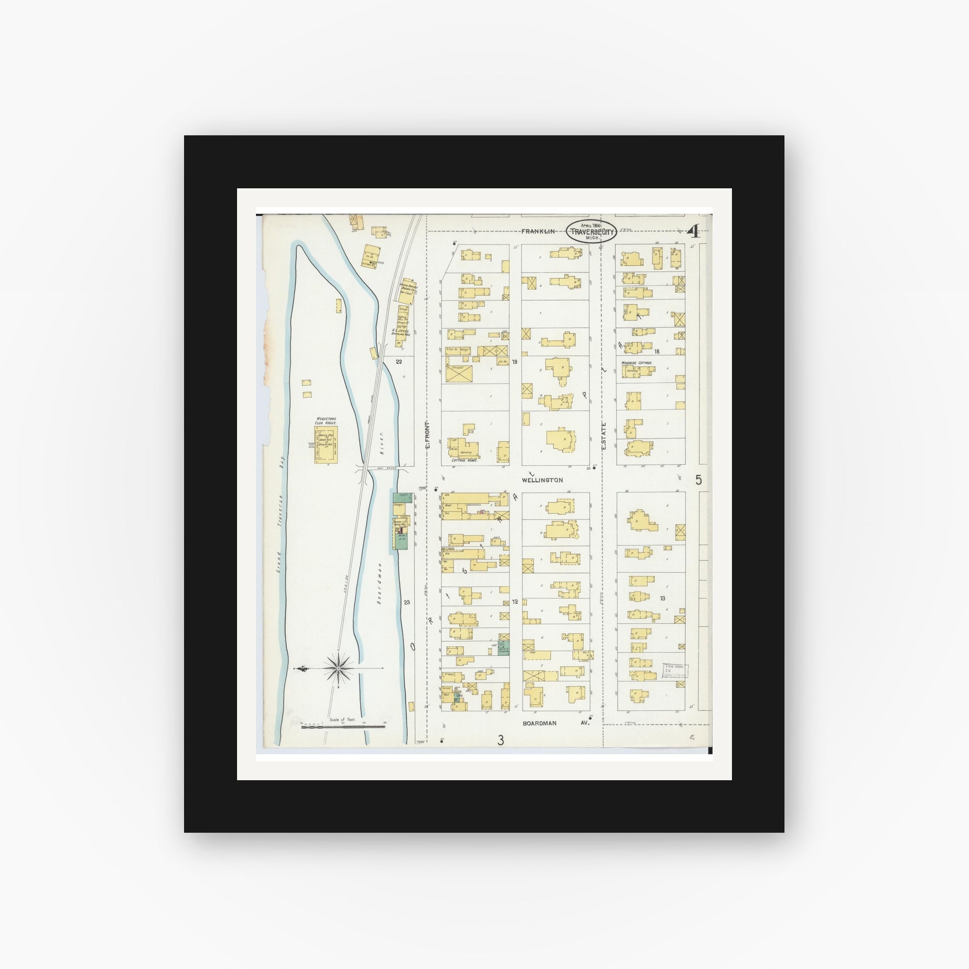 Old map wall art mockup — black gallery frame with white mat — Sanborn Fire Insurance Map from Traverse City, Grand Traverse County, Michigan (1904), Sheet #0004