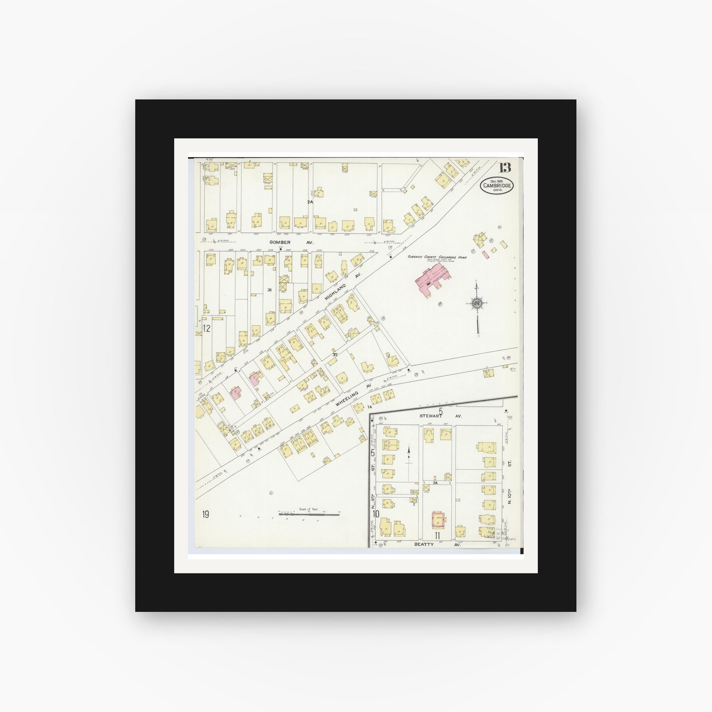 Old map wall art mockup — black gallery frame with white mat — Sanborn Fire Insurance Map from Cambridge, Guernsey County, Ohio (1909), Sheet #0013