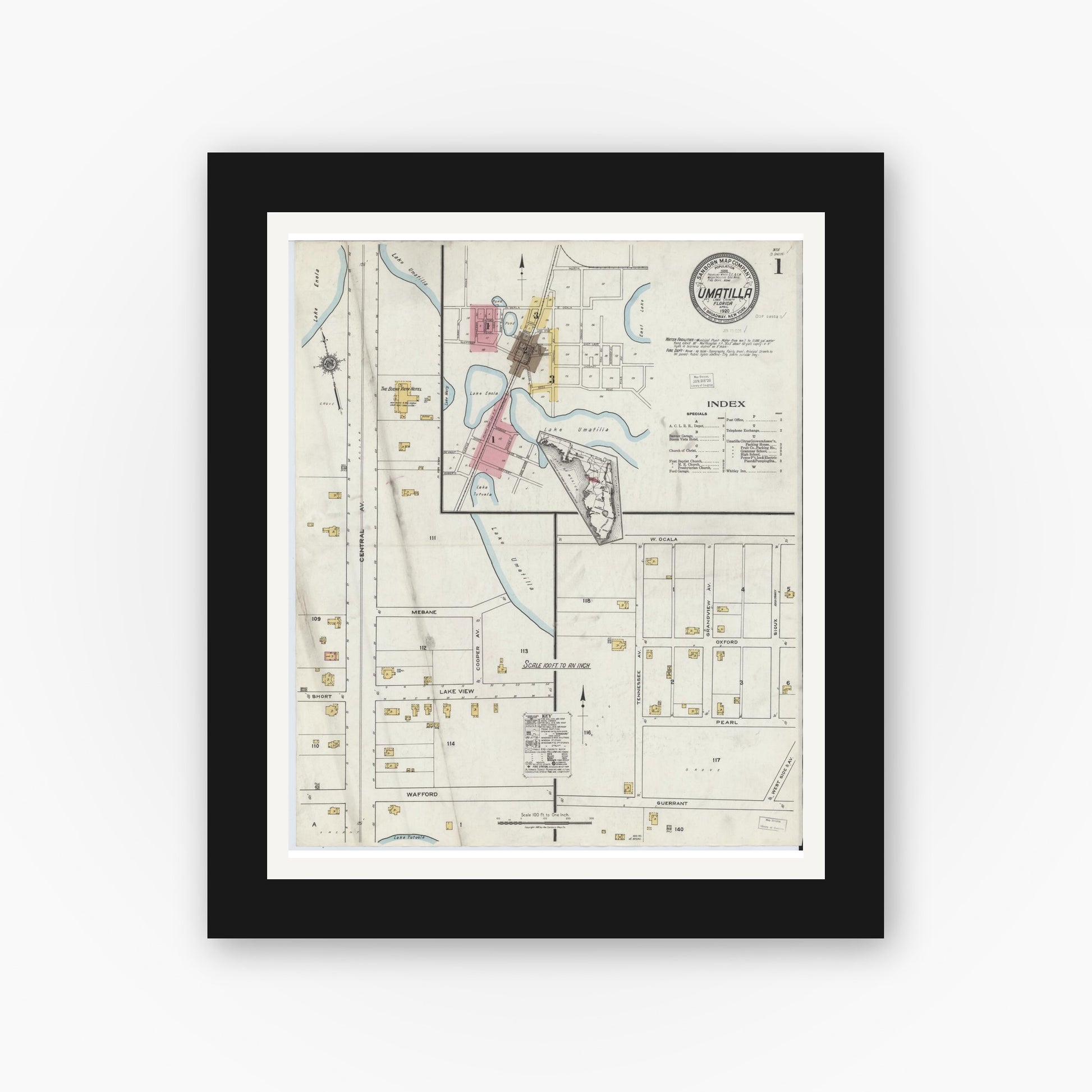 Old map wall art mockup — black gallery frame with white mat — Sanborn Fire Insurance Map from Umatilla, Lake County, Florida (1920) - Complete Map Set