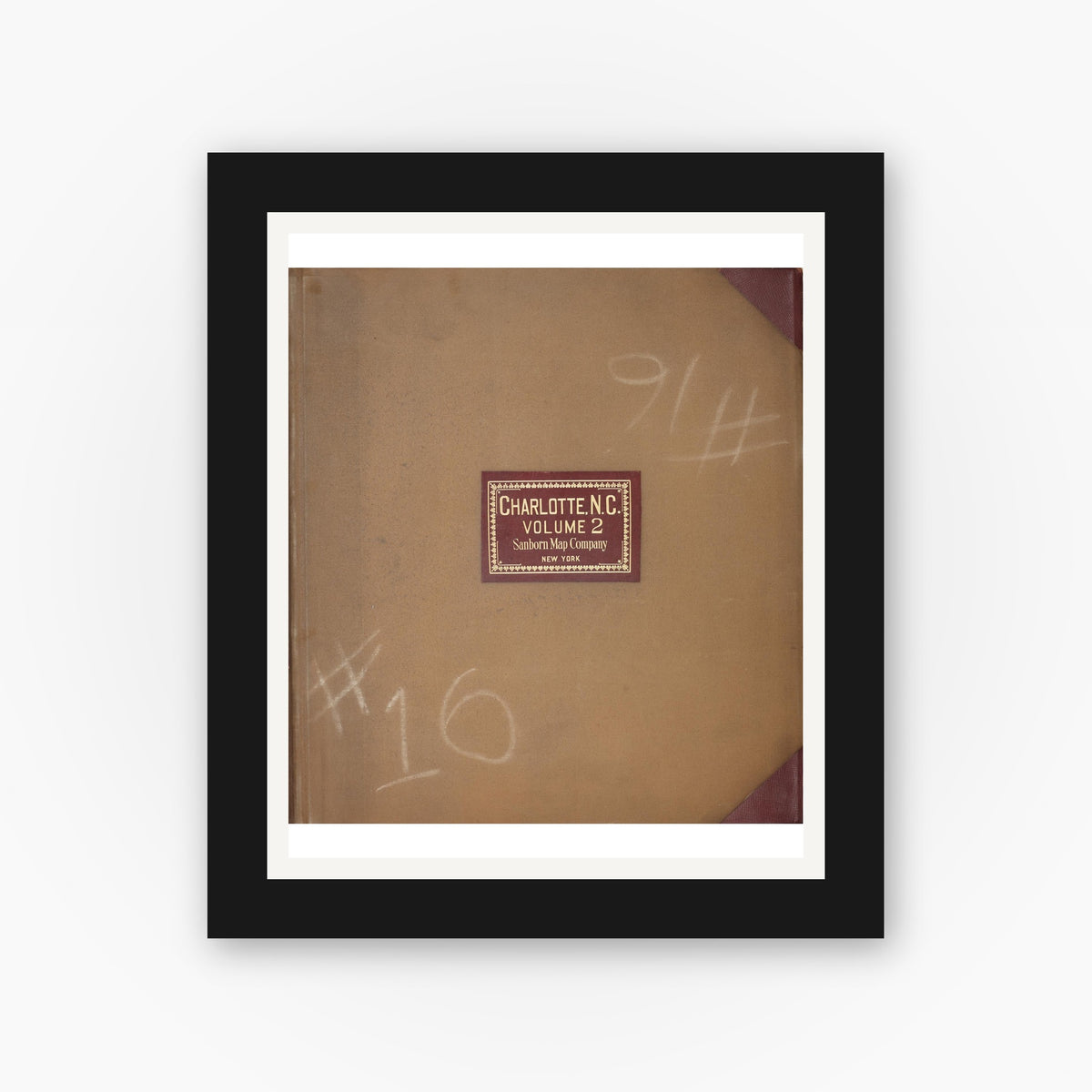 Old map wall art mockup — black gallery frame with white mat — Sanborn Fire Insurance Map from Charlotte, Mecklenburg County, North Carolina (1950), Sheet #0001