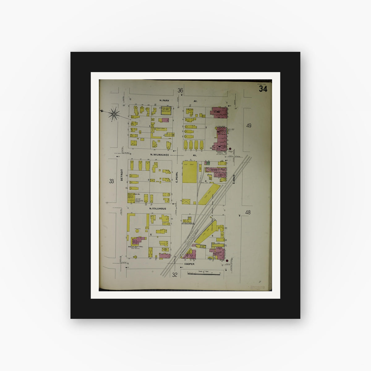 Old map wall art mockup — black gallery frame with white mat — Sanborn Fire Insurance Map from Jackson, Jackson County, Michigan (1907), Sheet #0034