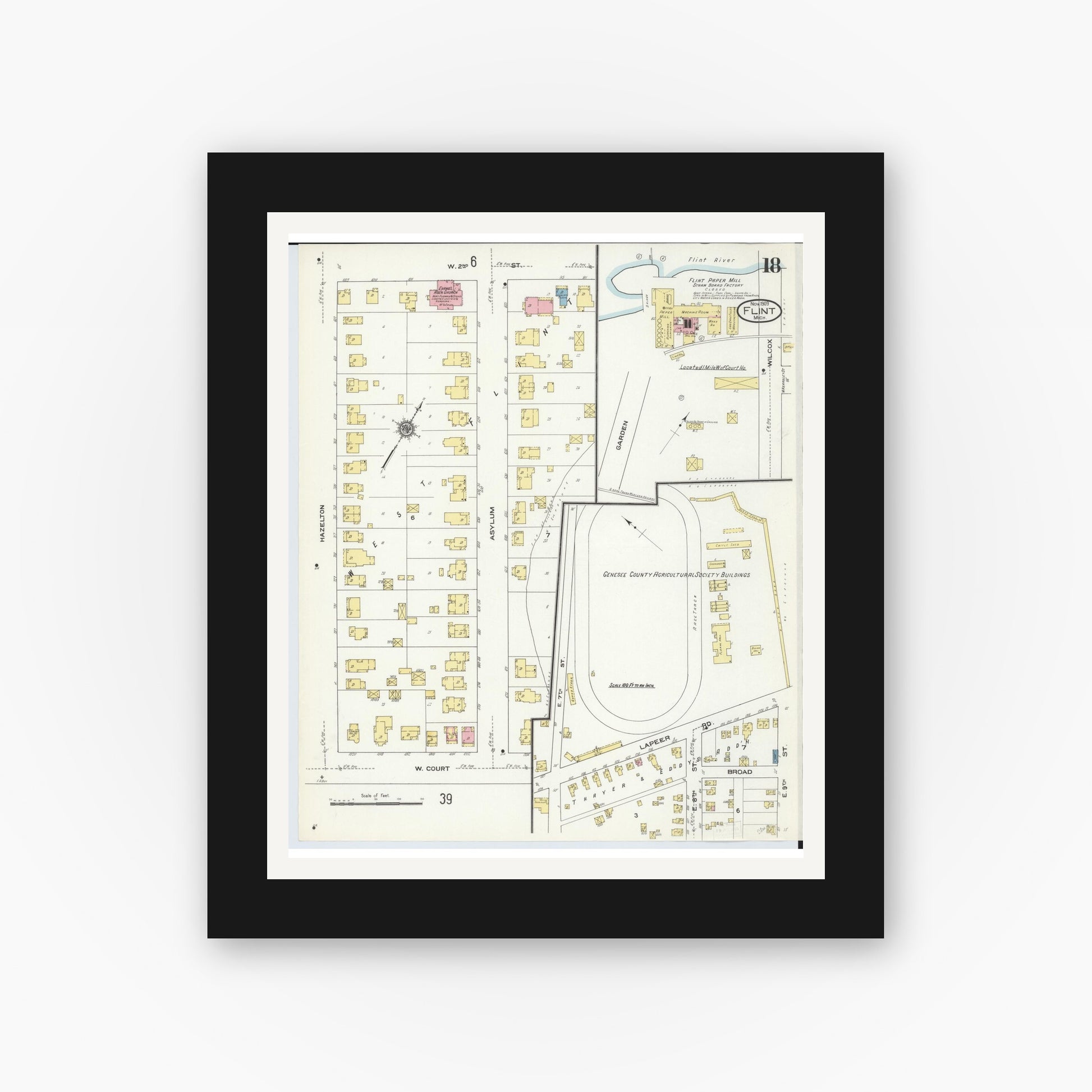Old map wall art mockup — black gallery frame with white mat — Sanborn Fire Insurance Map from Flint, Genesee County, Michigan (1909), Sheet #0018