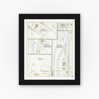 Old map wall art mockup — black gallery frame with white mat — Sanborn Fire Insurance Map from Stambaugh, Iron County, Michigan (1900), Sheet #0002