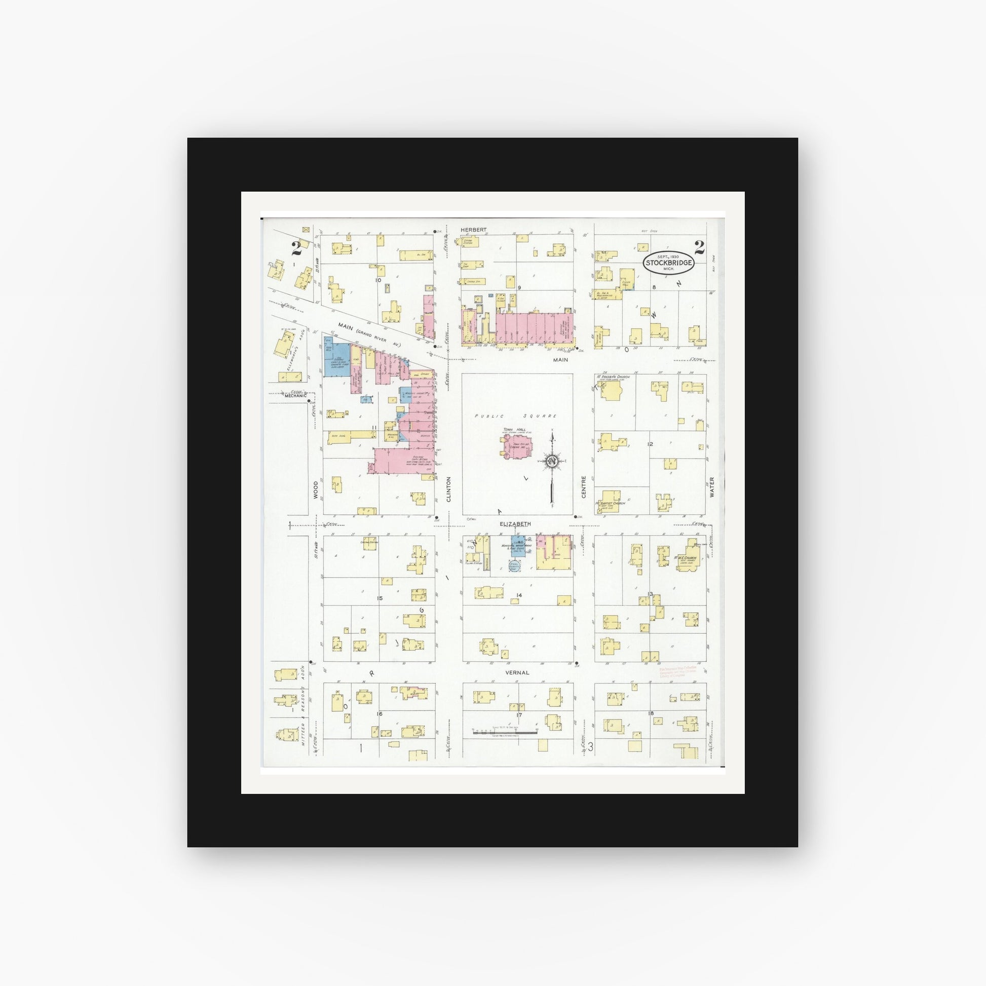 Old map wall art mockup — black gallery frame with white mat — Sanborn Fire Insurance Map from Stockbridge, Ingham County, Michigan (1930), Sheet #0002