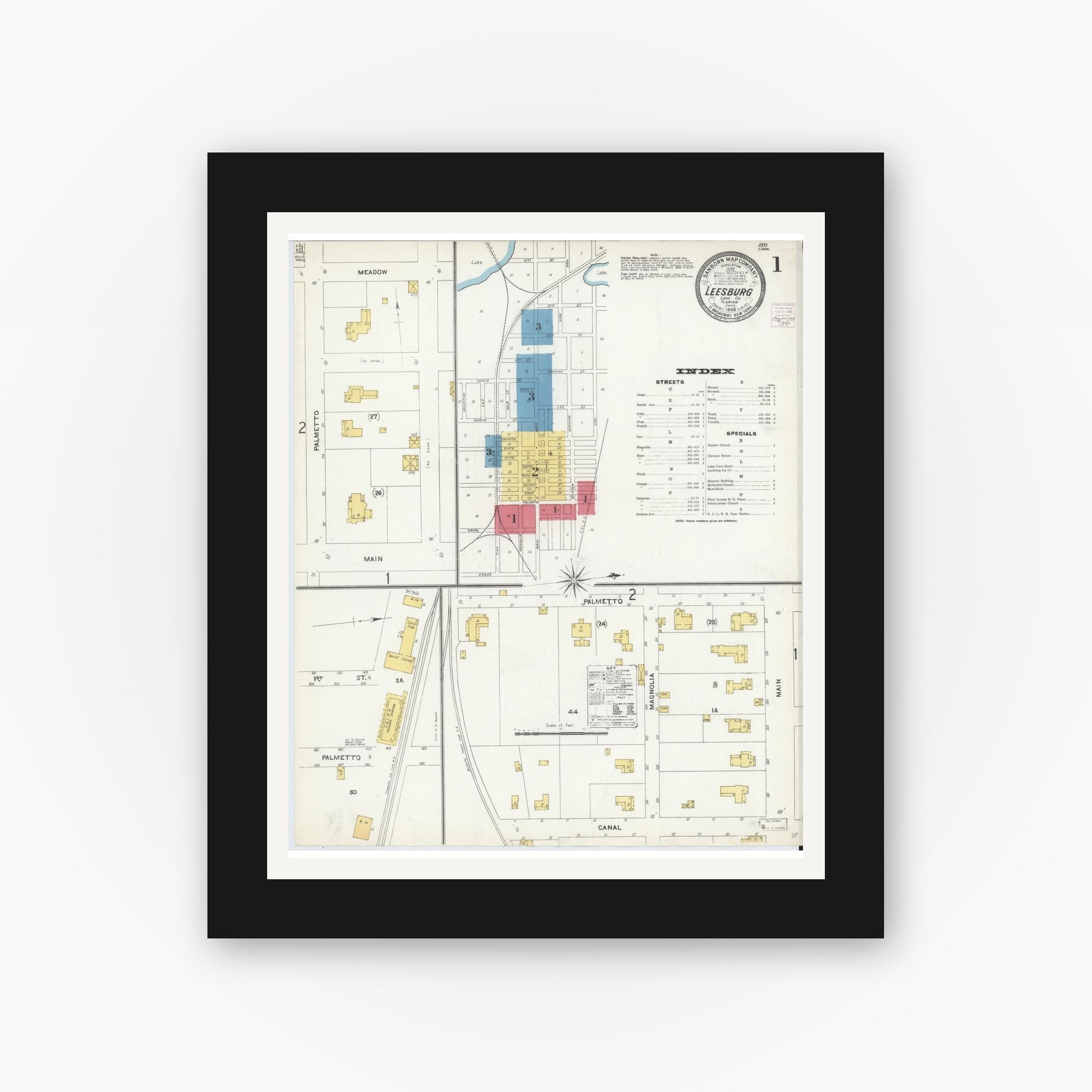 Old map wall art mockup — black gallery frame with white mat — Sanborn Fire Insurance Map from Leesburg, Lake County, Florida (1906), Sheet #0001