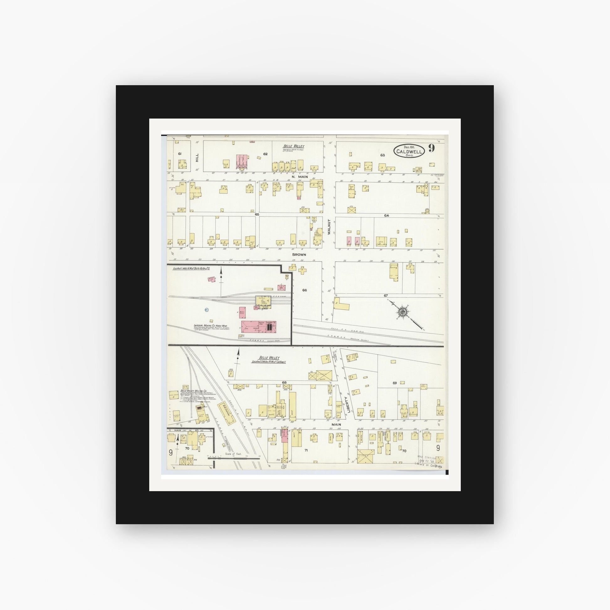 Old map wall art mockup — black gallery frame with white mat — Sanborn Fire Insurance Map from Caldwell, Noble County, Ohio (1911), Sheet #0009