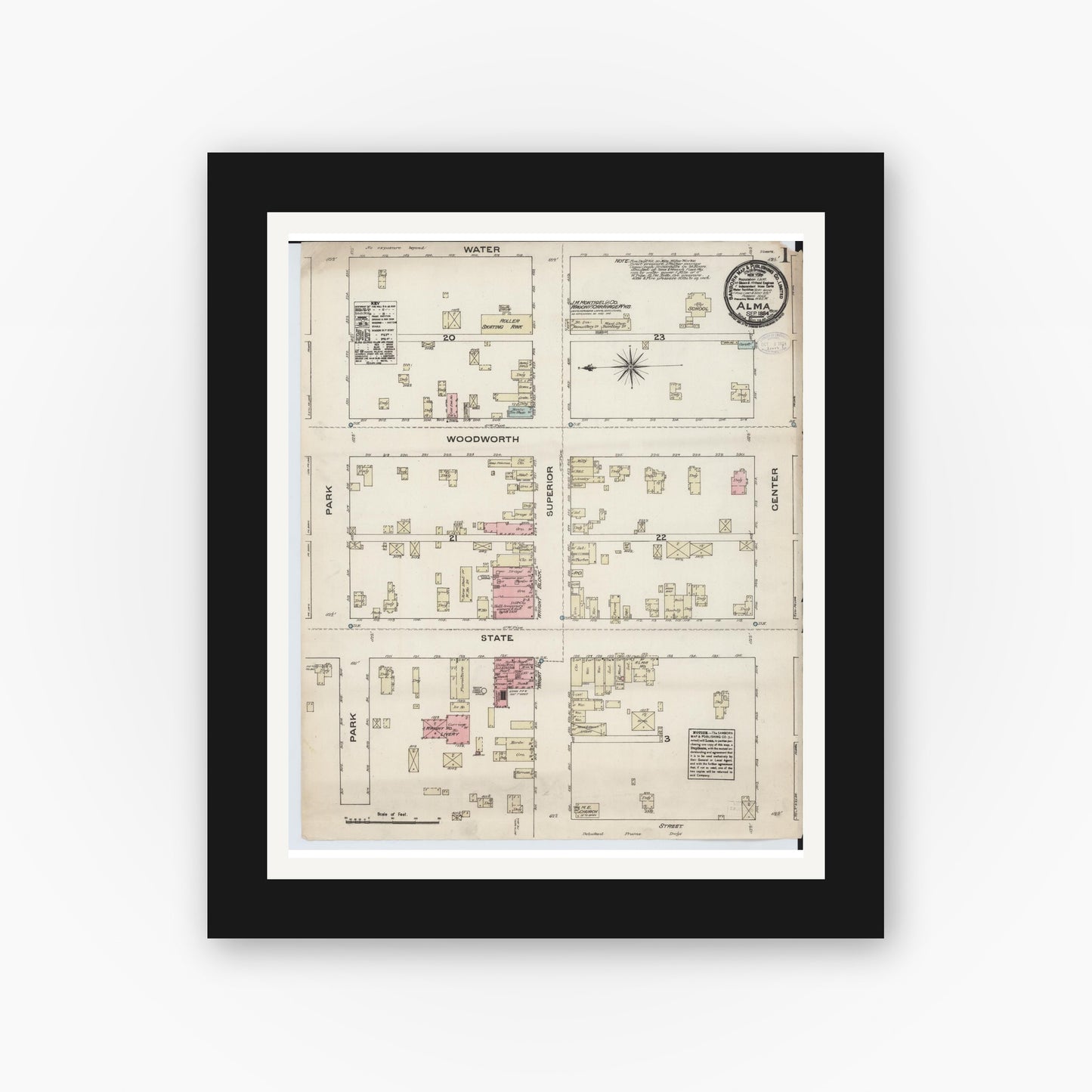 Old map wall art mockup — black gallery frame with white mat — Sanborn Fire Insurance Map from Alma, Gratiot County, Michigan (1884), Sheet #0001