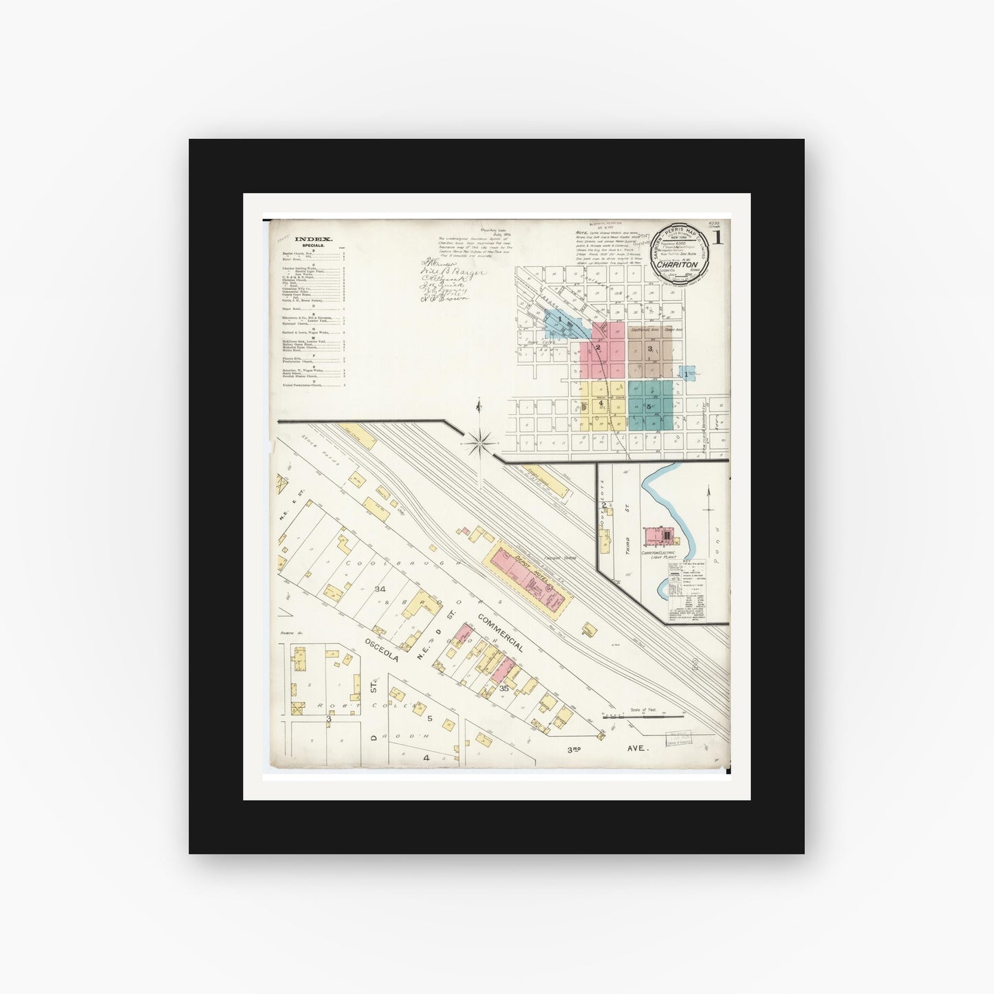 Old map wall art mockup — black gallery frame with white mat — Sanborn Fire Insurance Map from Chariton, Lucas County, Iowa (1893) â€” Complete Set