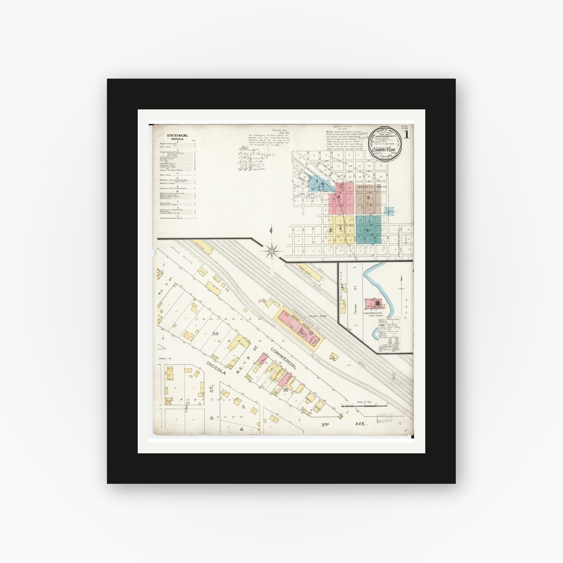 Old map wall art mockup — black gallery frame with white mat — Sanborn Fire Insurance Map from Chariton, Lucas County, Iowa (1893) â€” Complete Set