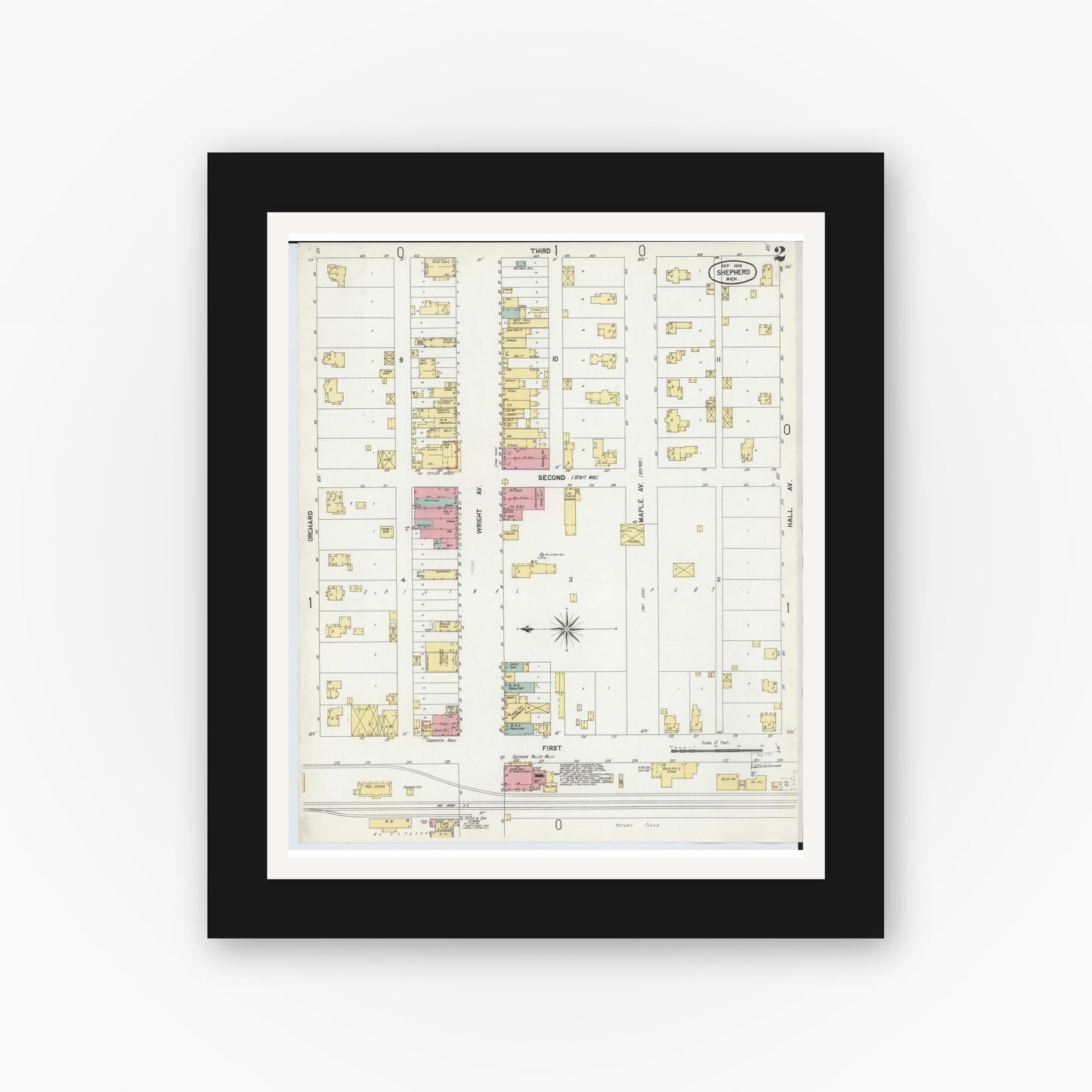 Old map wall art mockup — black gallery frame with white mat — Sanborn Fire Insurance Map from Shepherd, Isabella County, Michigan (1902), Sheet #0002