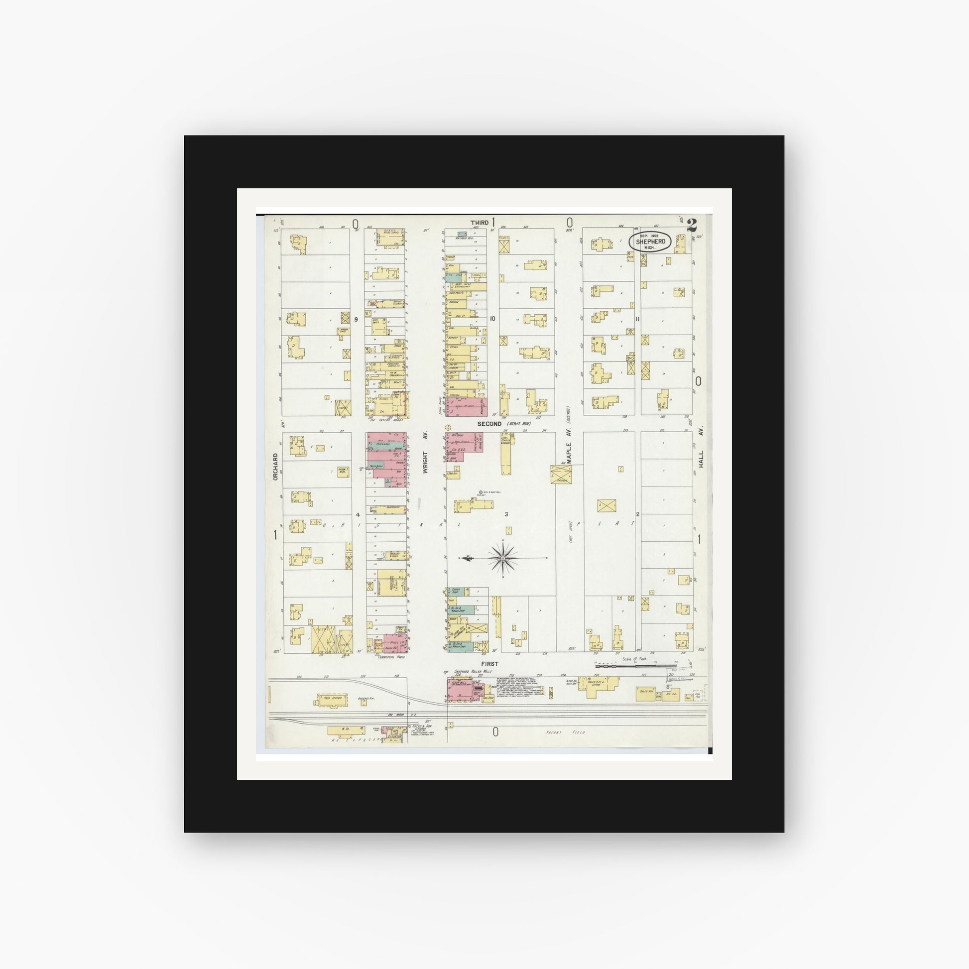 Old map wall art mockup — black gallery frame with white mat — Sanborn Fire Insurance Map from Shepherd, Isabella County, Michigan (1902), Sheet #0002