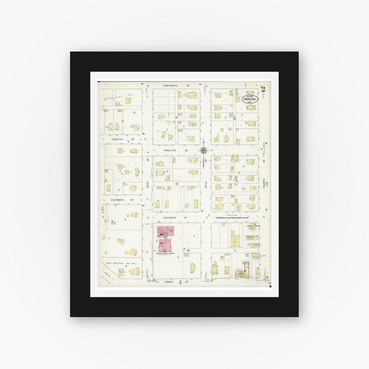 Old map wall art mockup — black gallery frame with white mat — Sanborn Fire Insurance Map from Windom, Cottonwood County, Minnesota (1913), Sheet #0002