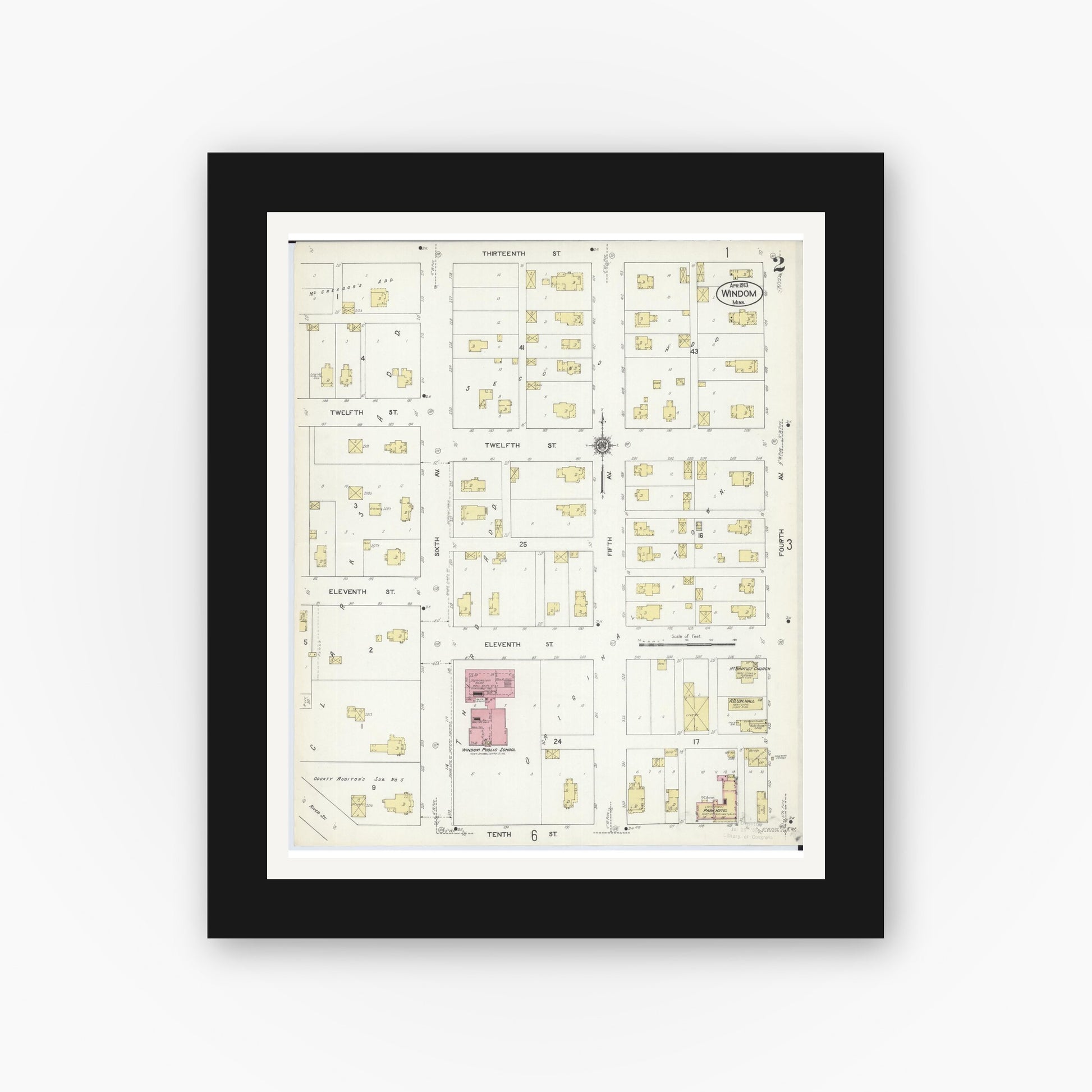 Old map wall art mockup — black gallery frame with white mat — Sanborn Fire Insurance Map from Windom, Cottonwood County, Minnesota (1913), Sheet #0002