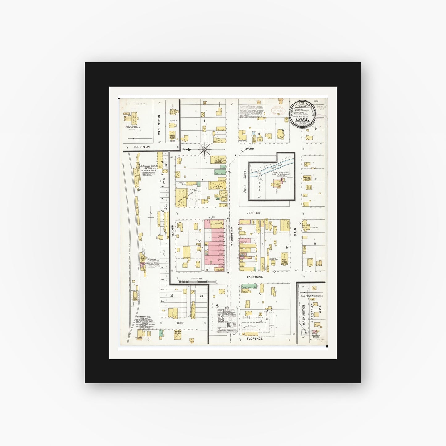 Old map wall art mockup — black gallery frame with white mat — Sanborn Fire Insurance Map from Exira, Audubon County, Iowa (1899), Sheet #0001