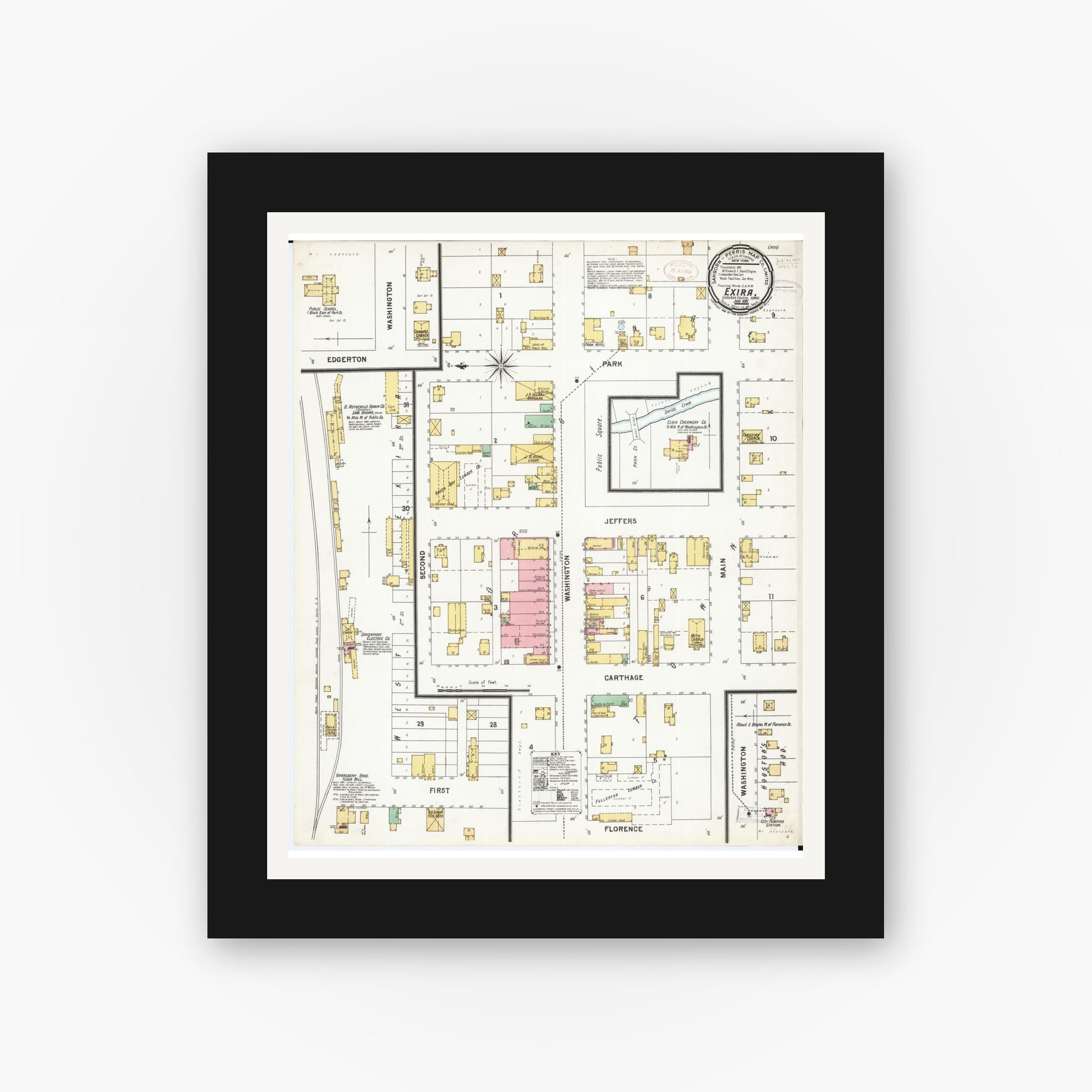 Old map wall art mockup — black gallery frame with white mat — Sanborn Fire Insurance Map from Exira, Audubon County, Iowa (1899), Sheet #0001