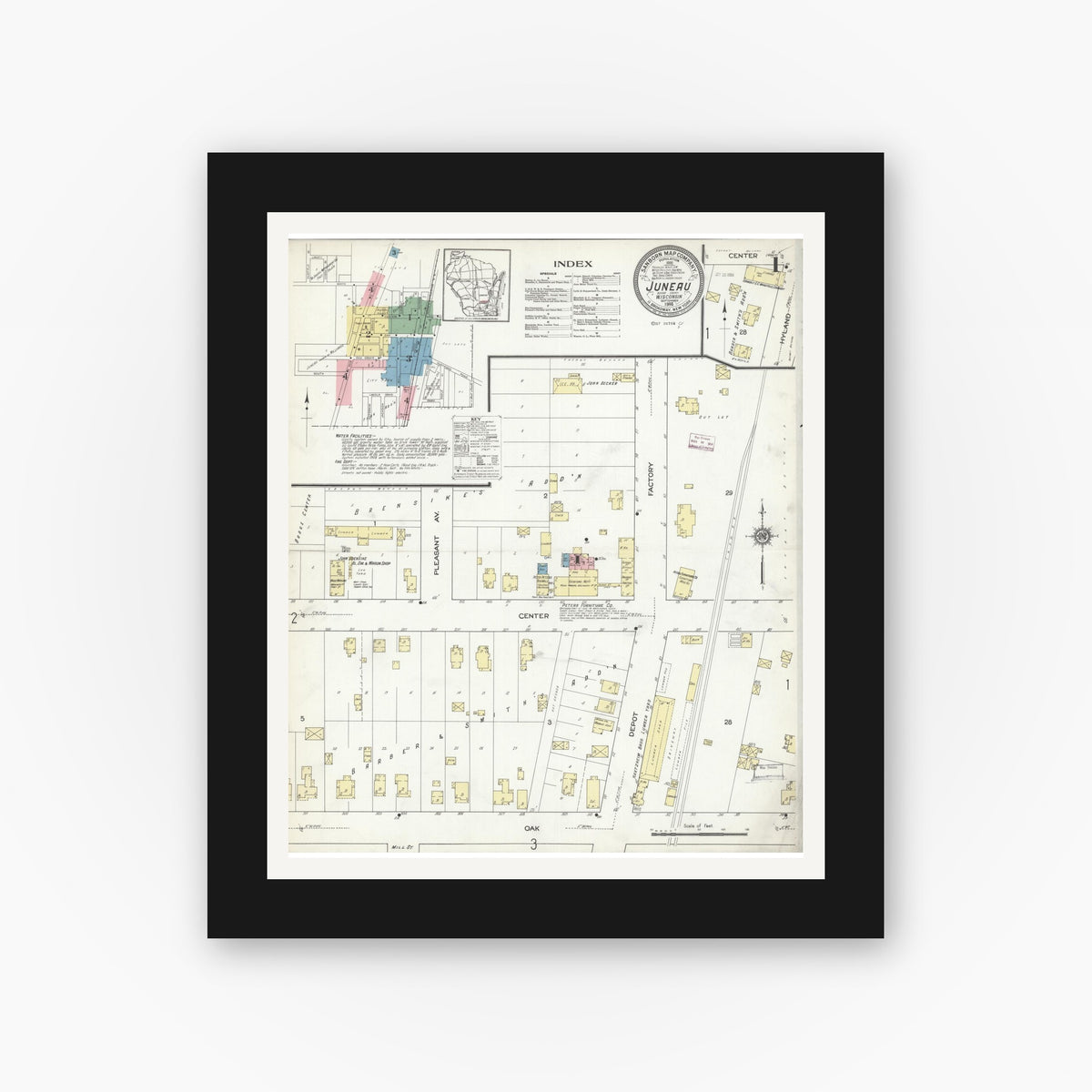 Old map wall art mockup — black gallery frame with white mat — Sanborn Fire Insurance Map from Juneau, Dodge County, Wisconsin (1914) - Complete Map Set