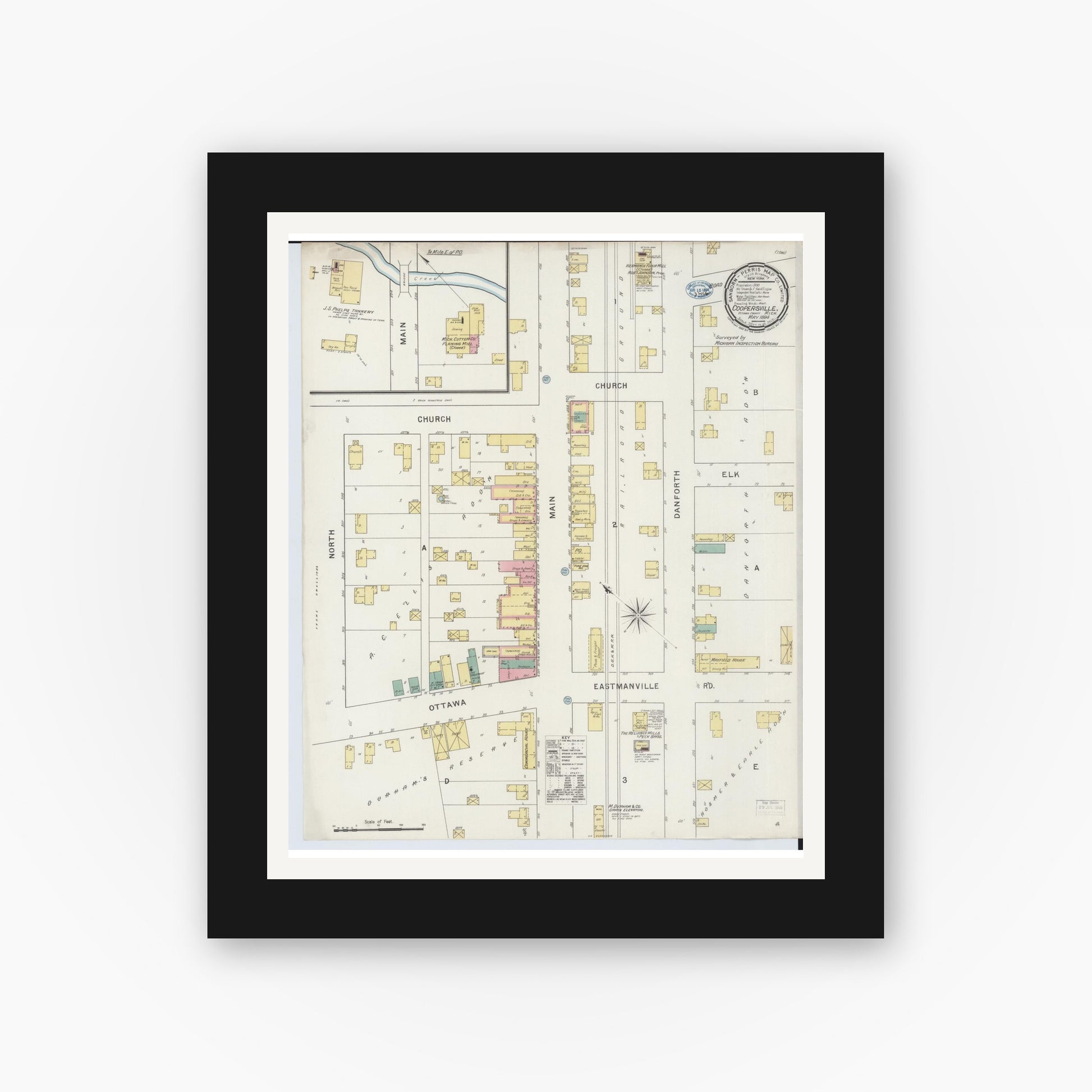 Old map wall art mockup — black gallery frame with white mat — Sanborn Fire Insurance Map from Coopersville, Ottawa County, Michigan (1894), Sheet #0001