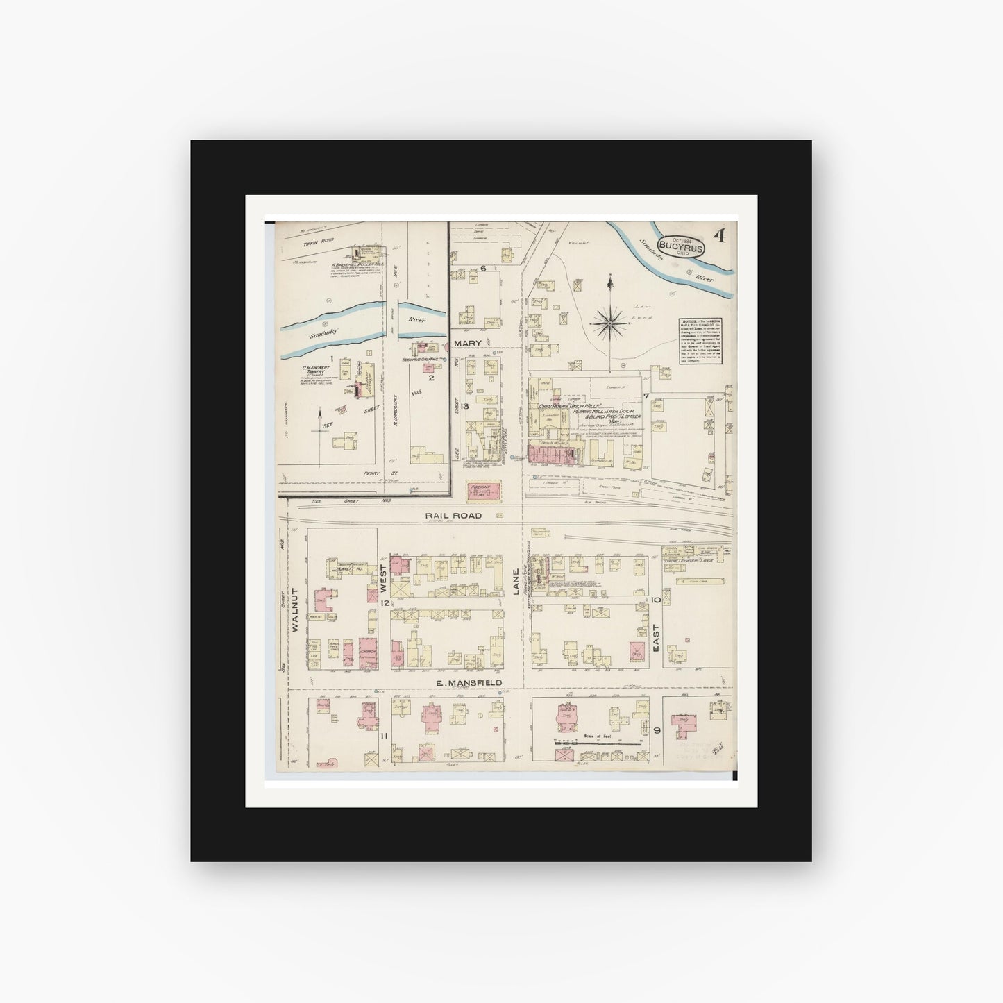 Old map wall art mockup — black gallery frame with white mat — Sanborn Fire Insurance Map from Bucyrus, Crawford County, Ohio (1884), Sheet #0004