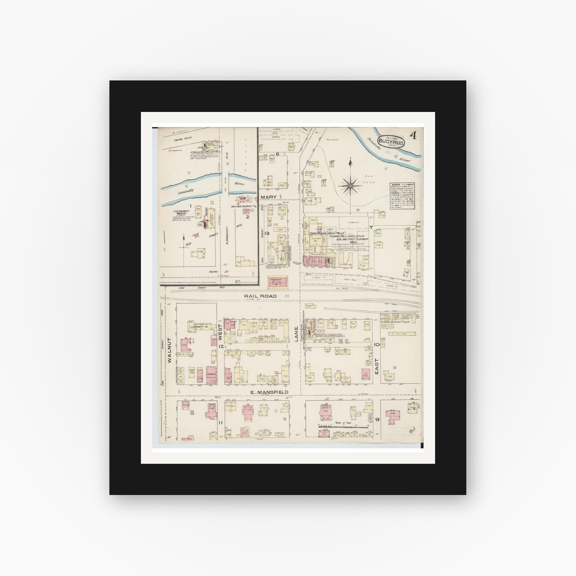 Old map wall art mockup — black gallery frame with white mat — Sanborn Fire Insurance Map from Bucyrus, Crawford County, Ohio (1884), Sheet #0004