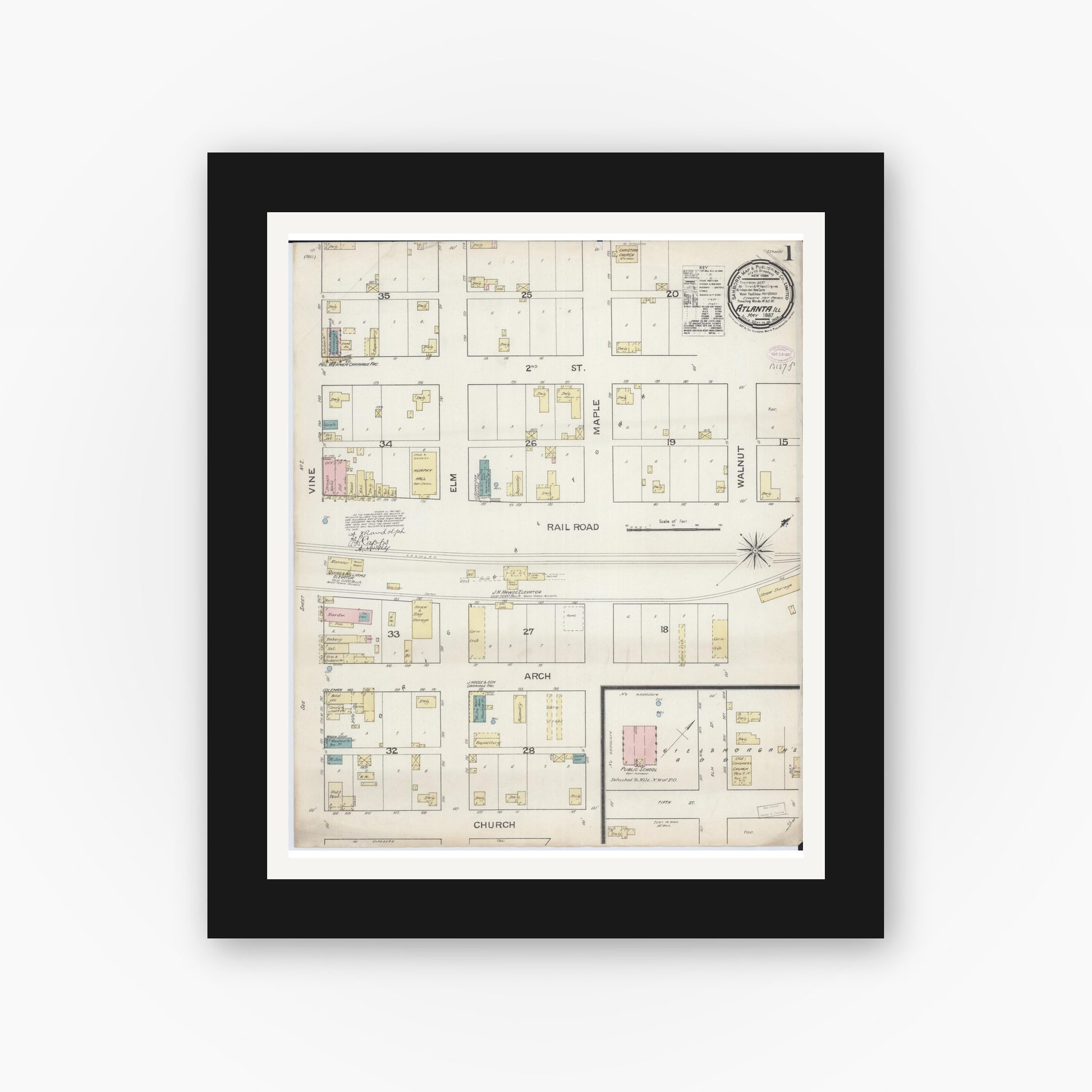 Old map wall art mockup — black gallery frame with white mat — Sanborn Fire Insurance Map from Atlanta, Logan County, Illinois (1887), Sheet #0001