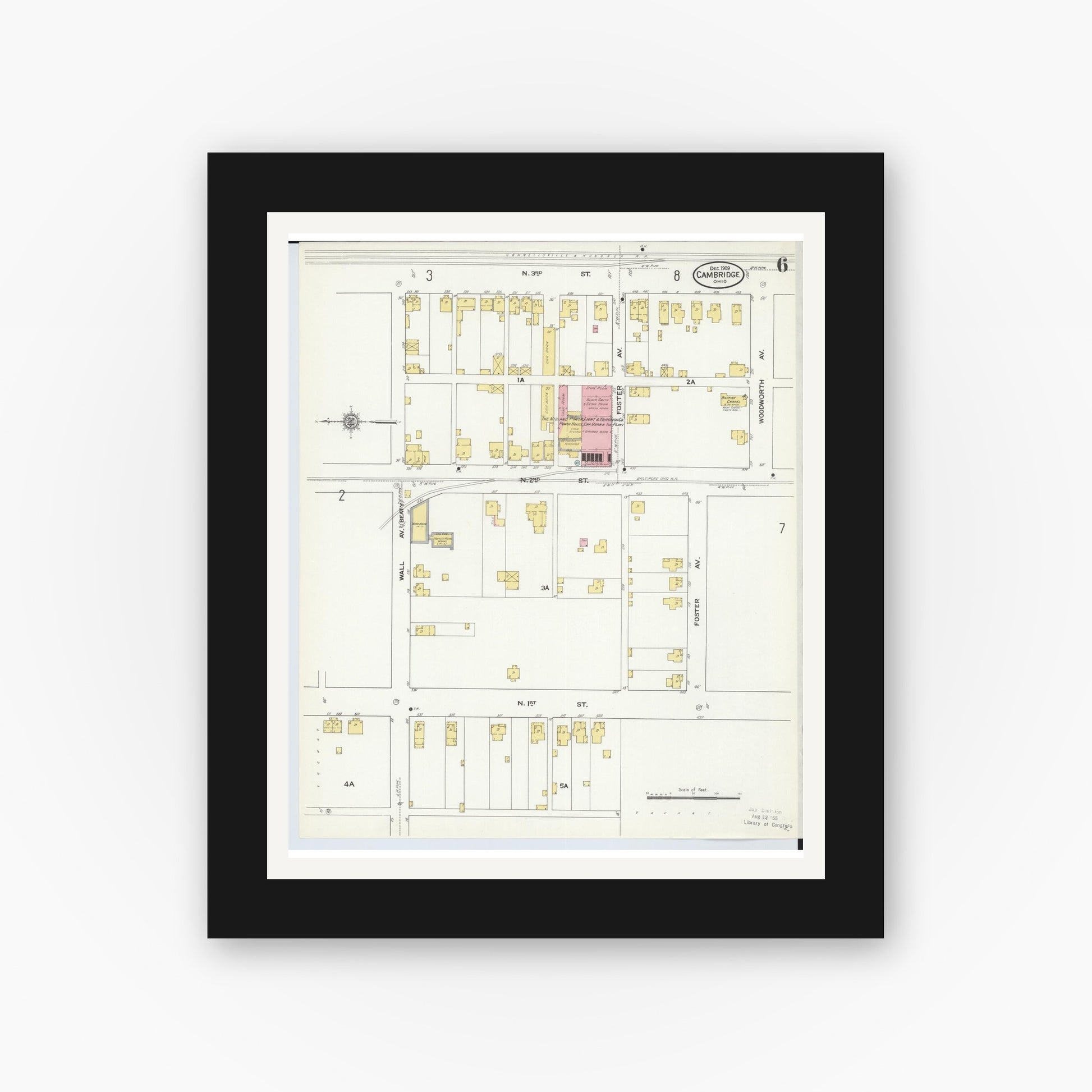 Old map wall art mockup — black gallery frame with white mat — Sanborn Fire Insurance Map from Cambridge, Guernsey County, Ohio (1909), Sheet #0006