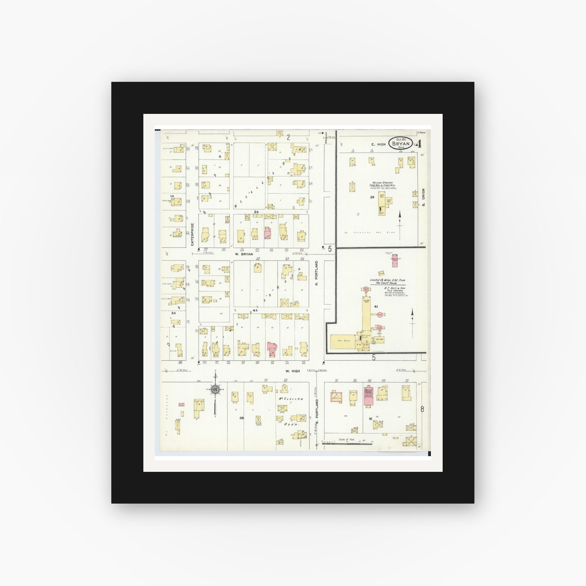Old map wall art mockup — black gallery frame with white mat — Sanborn Fire Insurance Map from Bryan, Williams County, Ohio (1911), Sheet #0004
