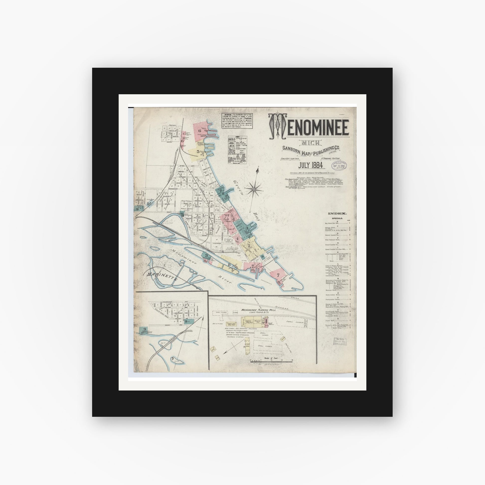 Old map wall art mockup — black gallery frame with white mat — Sanborn Fire Insurance Map from Menominee, Menominee County, Michigan (1884) - Complete Map Set