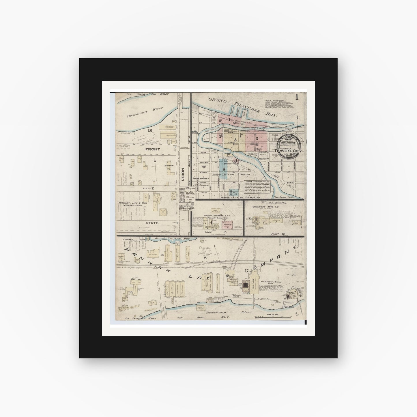 Old map wall art mockup — black gallery frame with white mat — Sanborn Fire Insurance Map from Traverse City, Grand Traverse County, Michigan (1884) - Complete Map Set