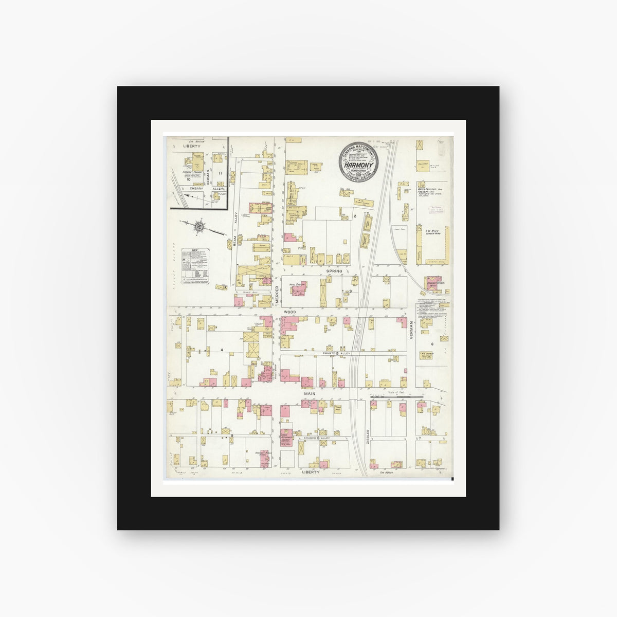 Old map wall art mockup — black gallery frame with white mat — Sanborn Fire Insurance Map from Harmony, Butler County, Pennsylvania (1912), Sheet #0001