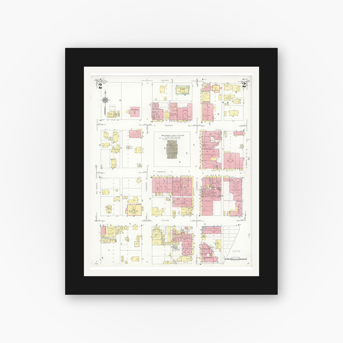 Old map wall art mockup — black gallery frame with white mat — Sanborn Fire Insurance Map from Conroe, Montgomery County, Texas (1938), Sheet #0002