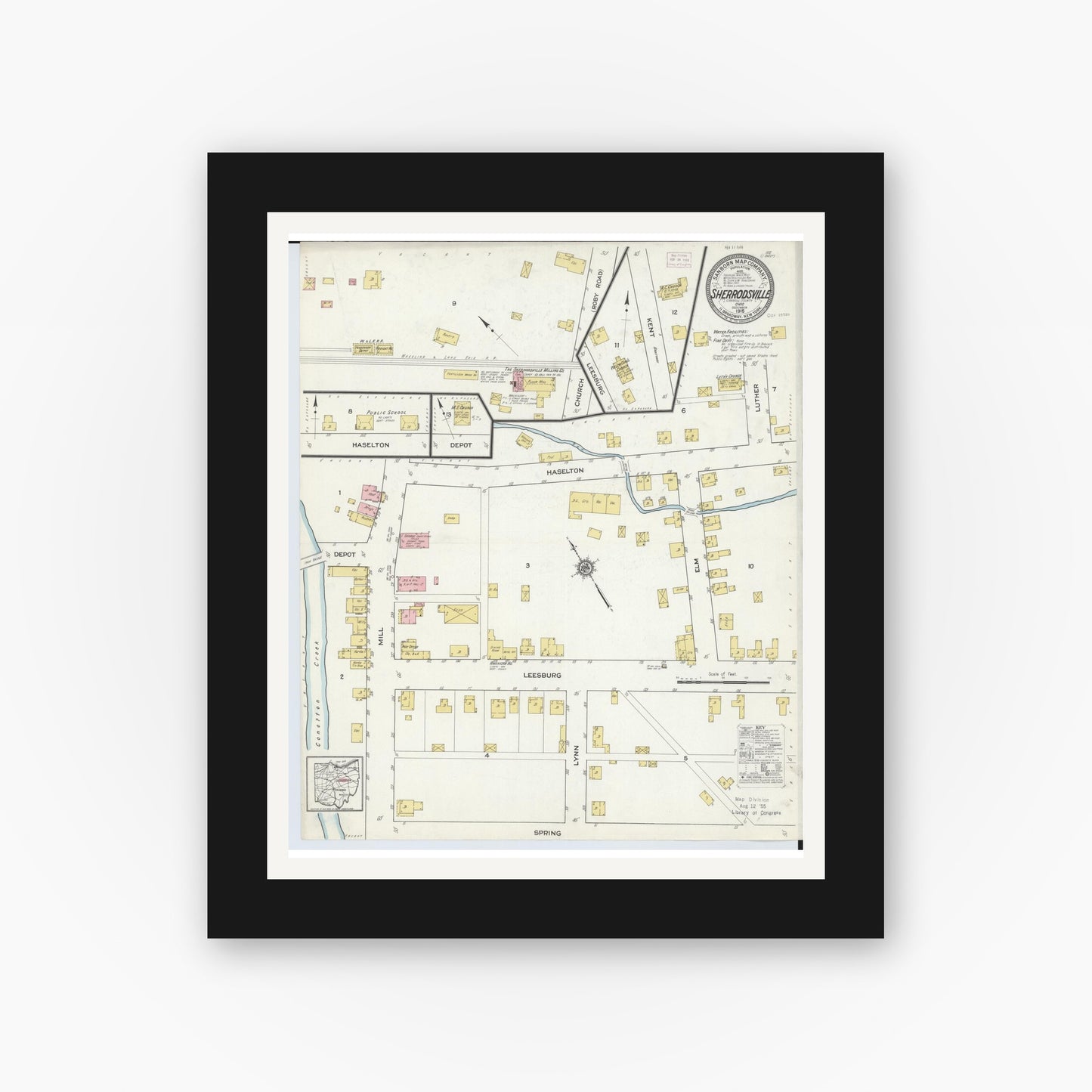 Old map wall art mockup — black gallery frame with white mat — Sanborn Fire Insurance Map from Sherrodsville, Carroll County, Ohio (1915), Sheet #0001