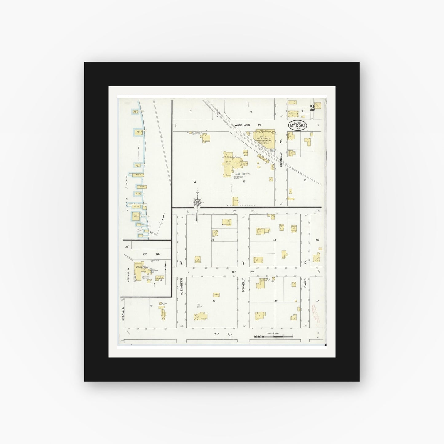 Old map wall art mockup — black gallery frame with white mat — Sanborn Fire Insurance Map from Mount Dora, Lake County, Florida (1912), Sheet #0002