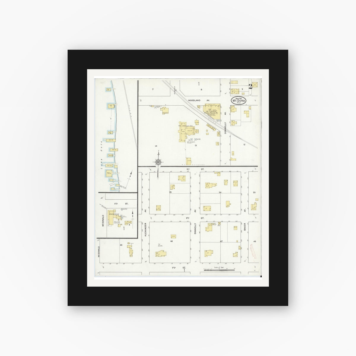 Old map wall art mockup — black gallery frame with white mat — Sanborn Fire Insurance Map from Mount Dora, Lake County, Florida (1912), Sheet #0002